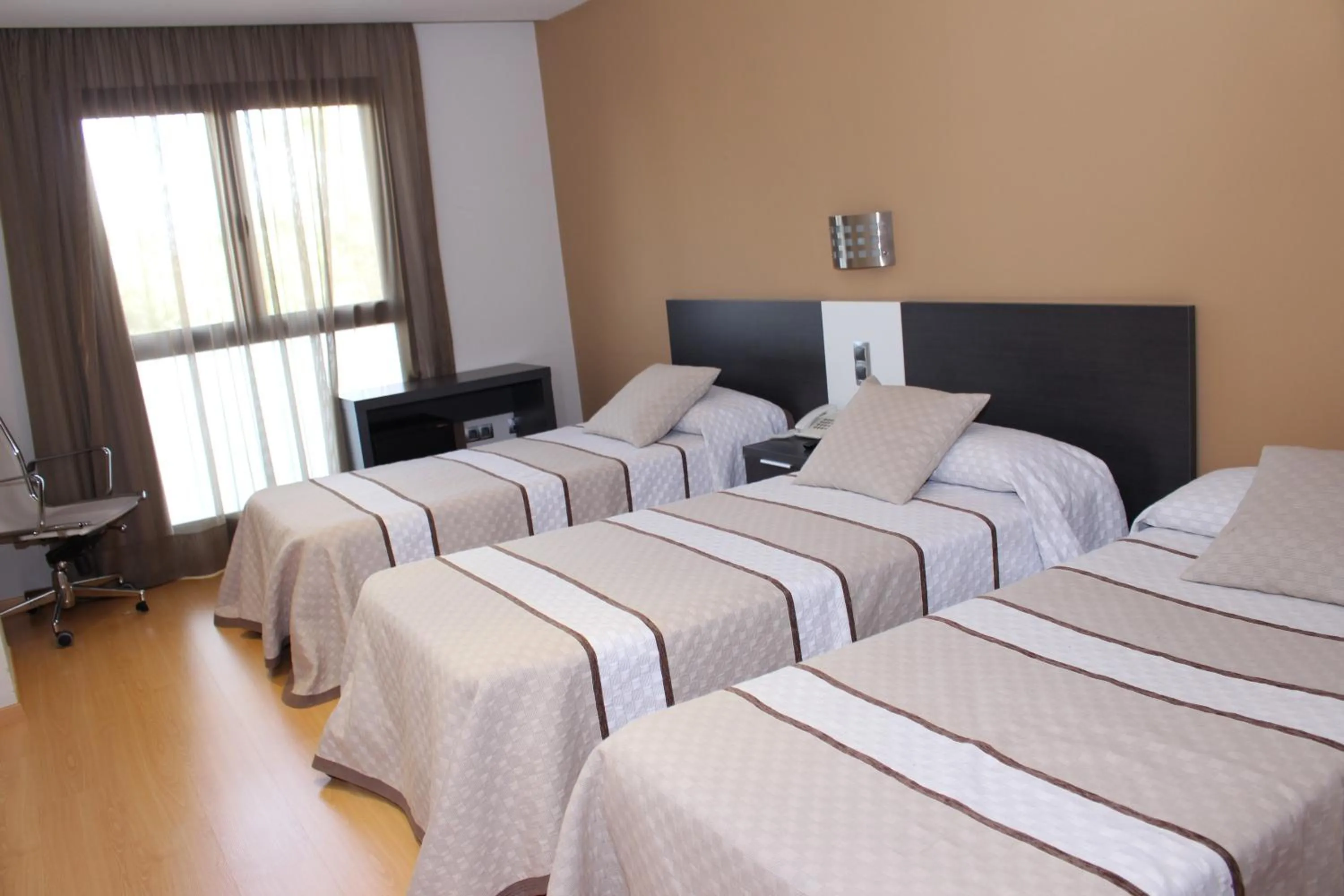 Bed in Hotel Ciutat d'Amposta