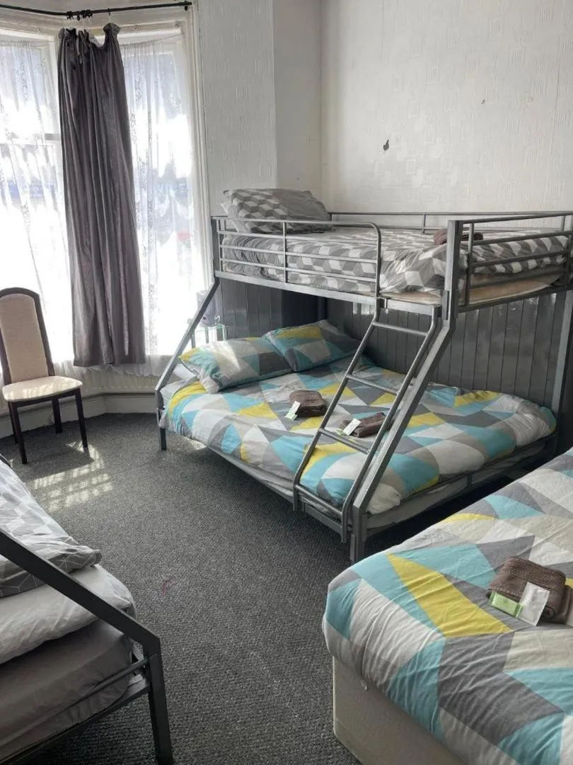 Bed in The Merlin Hotel