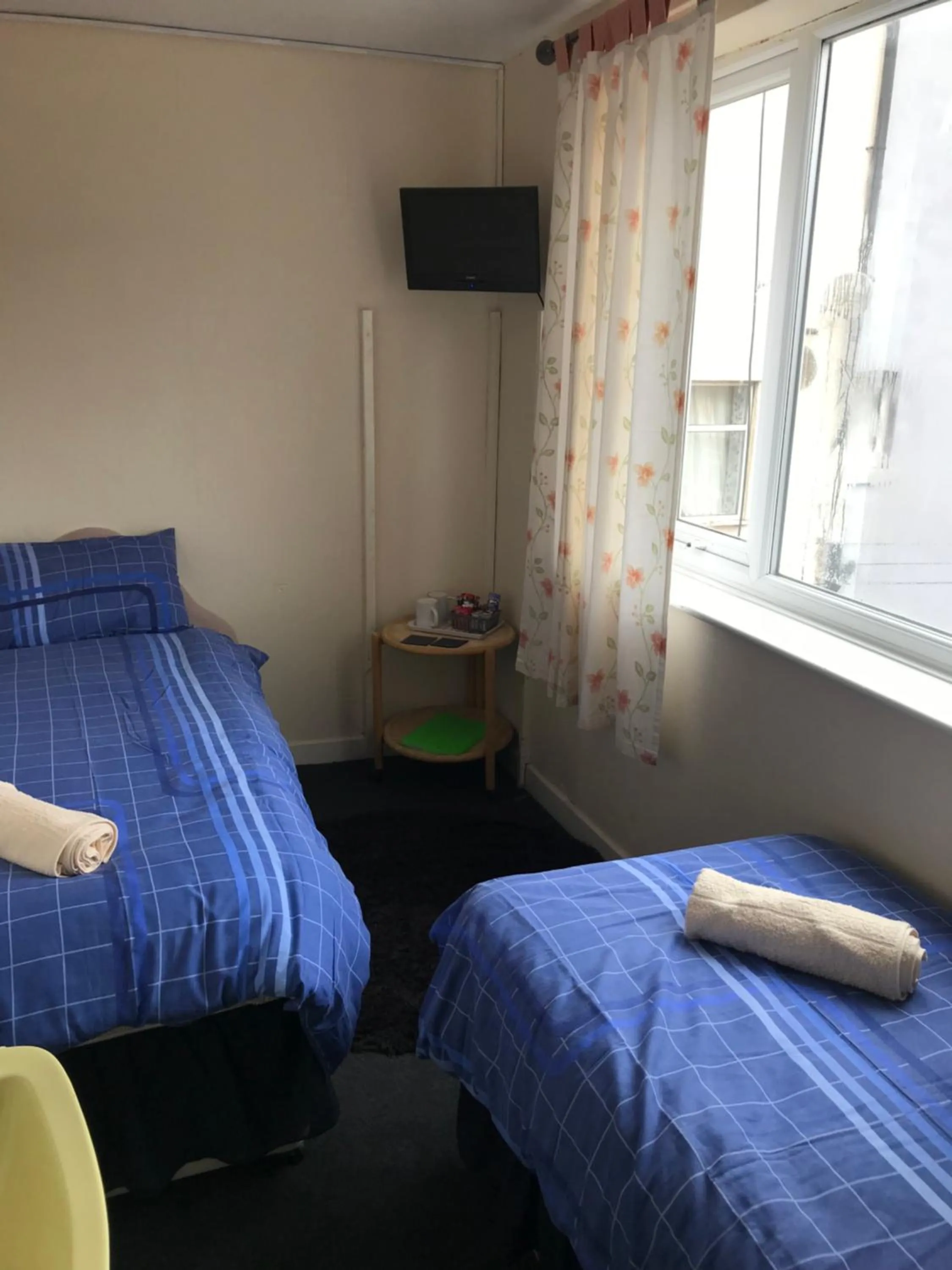 Bed in The Merlin Hotel