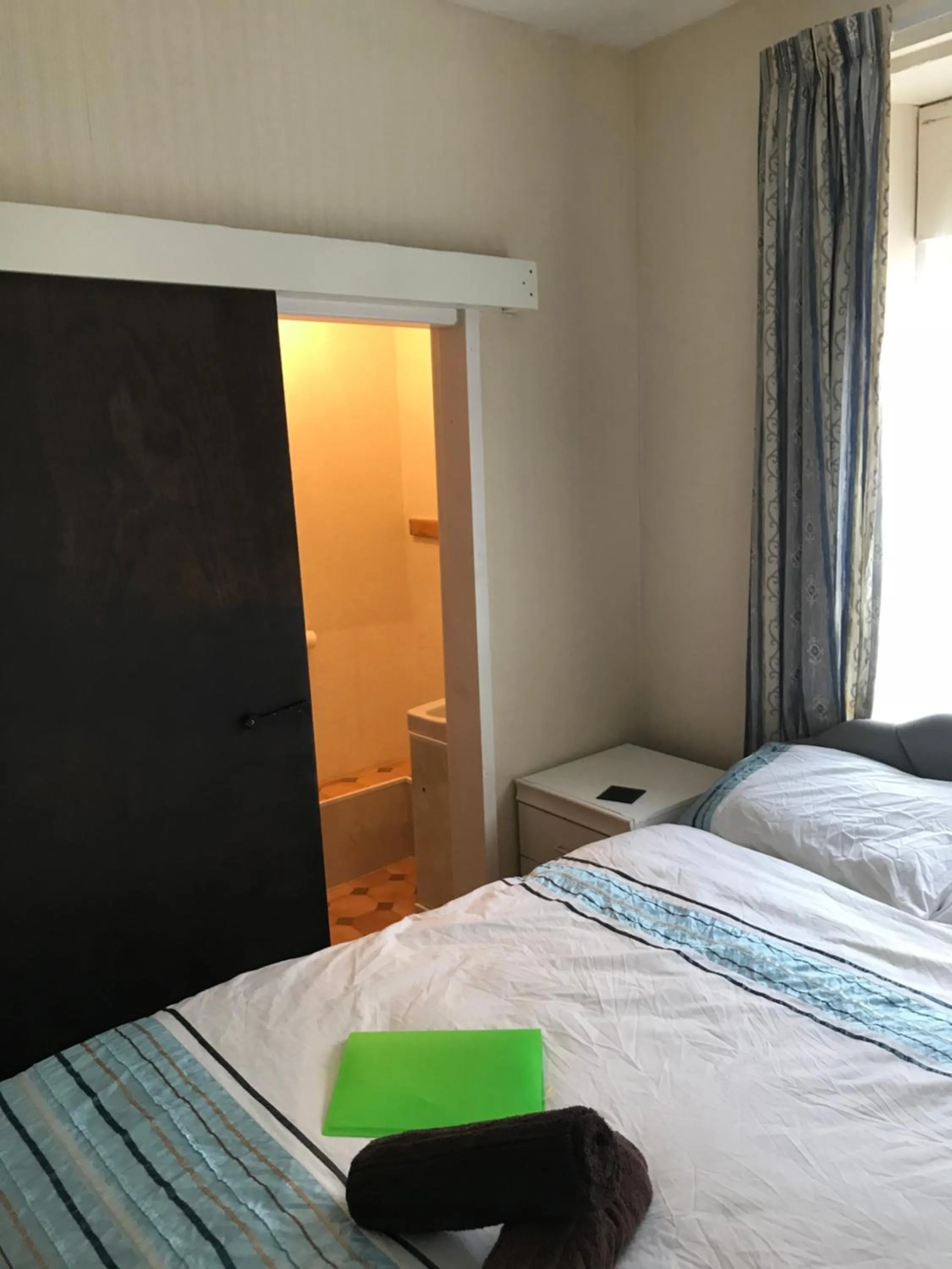 Bed in The Merlin Hotel