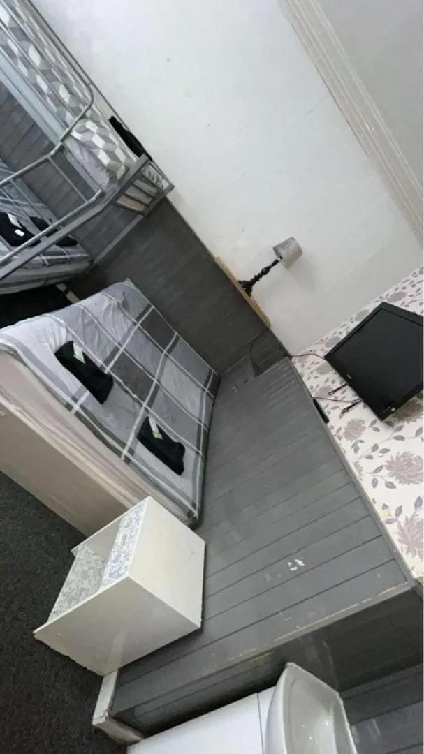 Bed in The Merlin Hotel