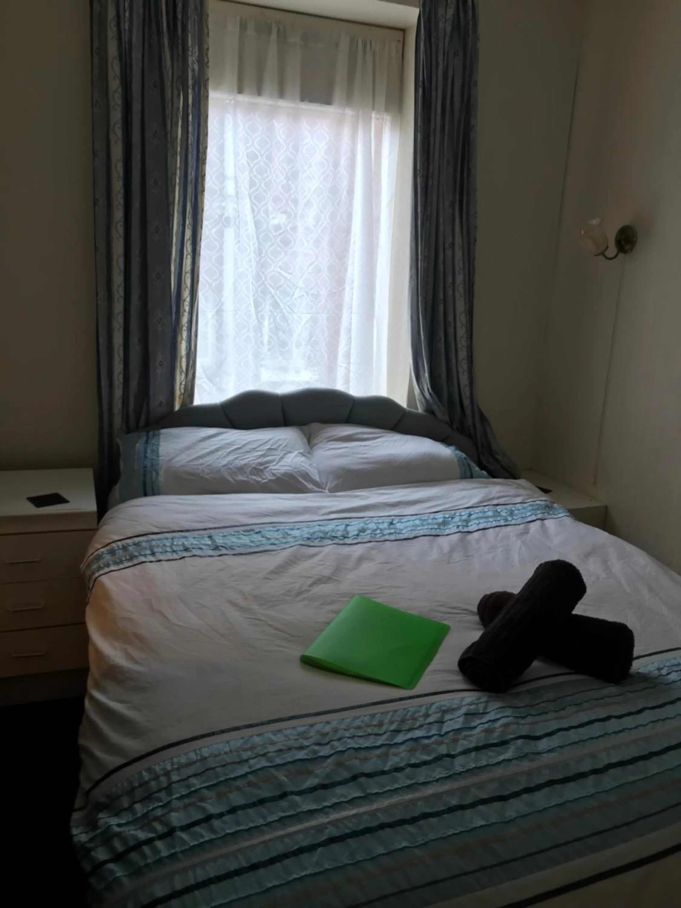 Bed in The Merlin Hotel