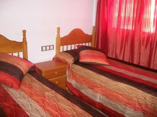Photo of the whole room, Bed in Apartamentos Albamar II