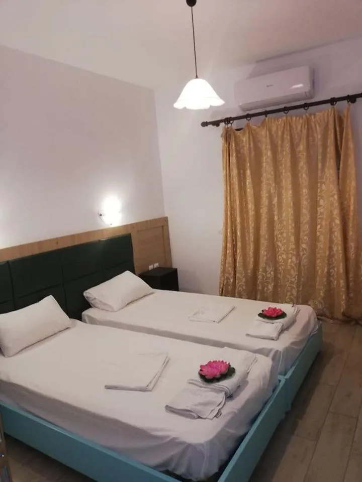 Bed in Gouvia House Luxury Apartments
