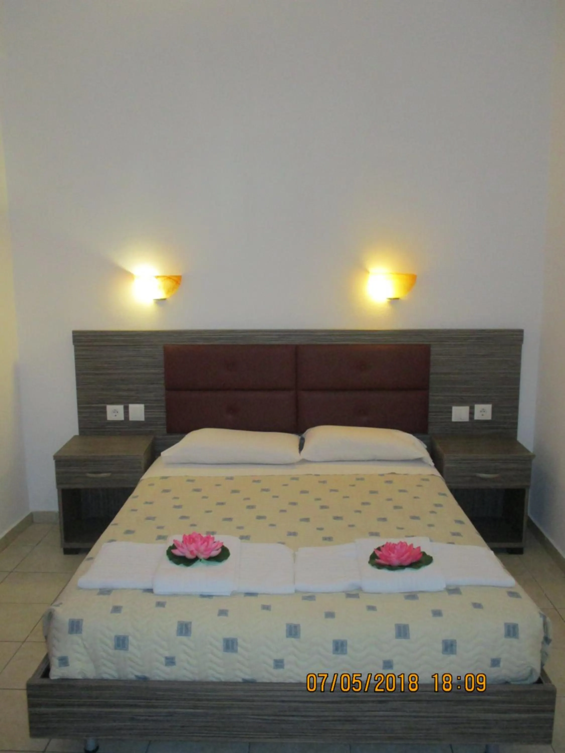Bed in Gouvia House Luxury Apartments