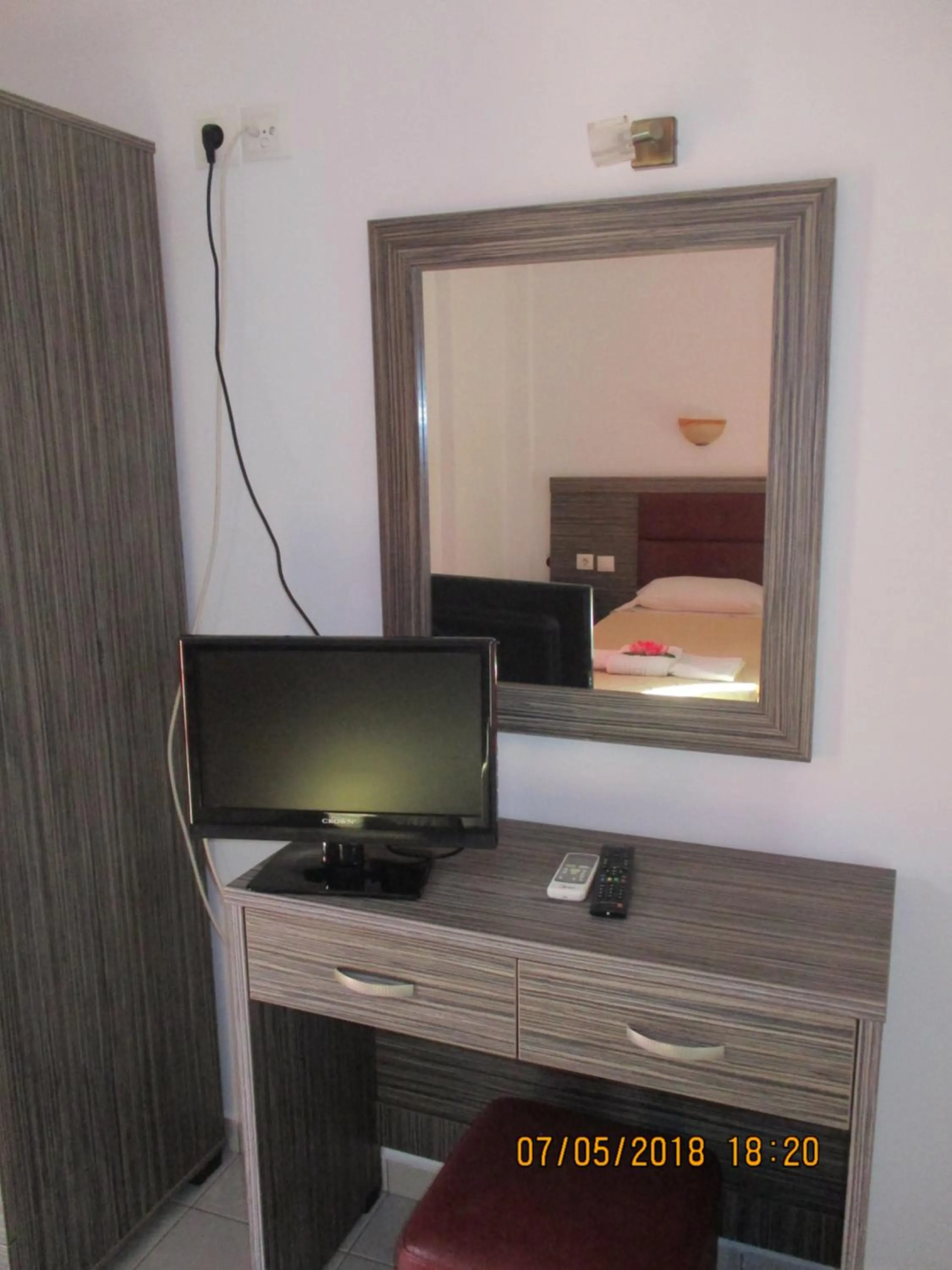 TV and multimedia in Gouvia House Luxury Apartments