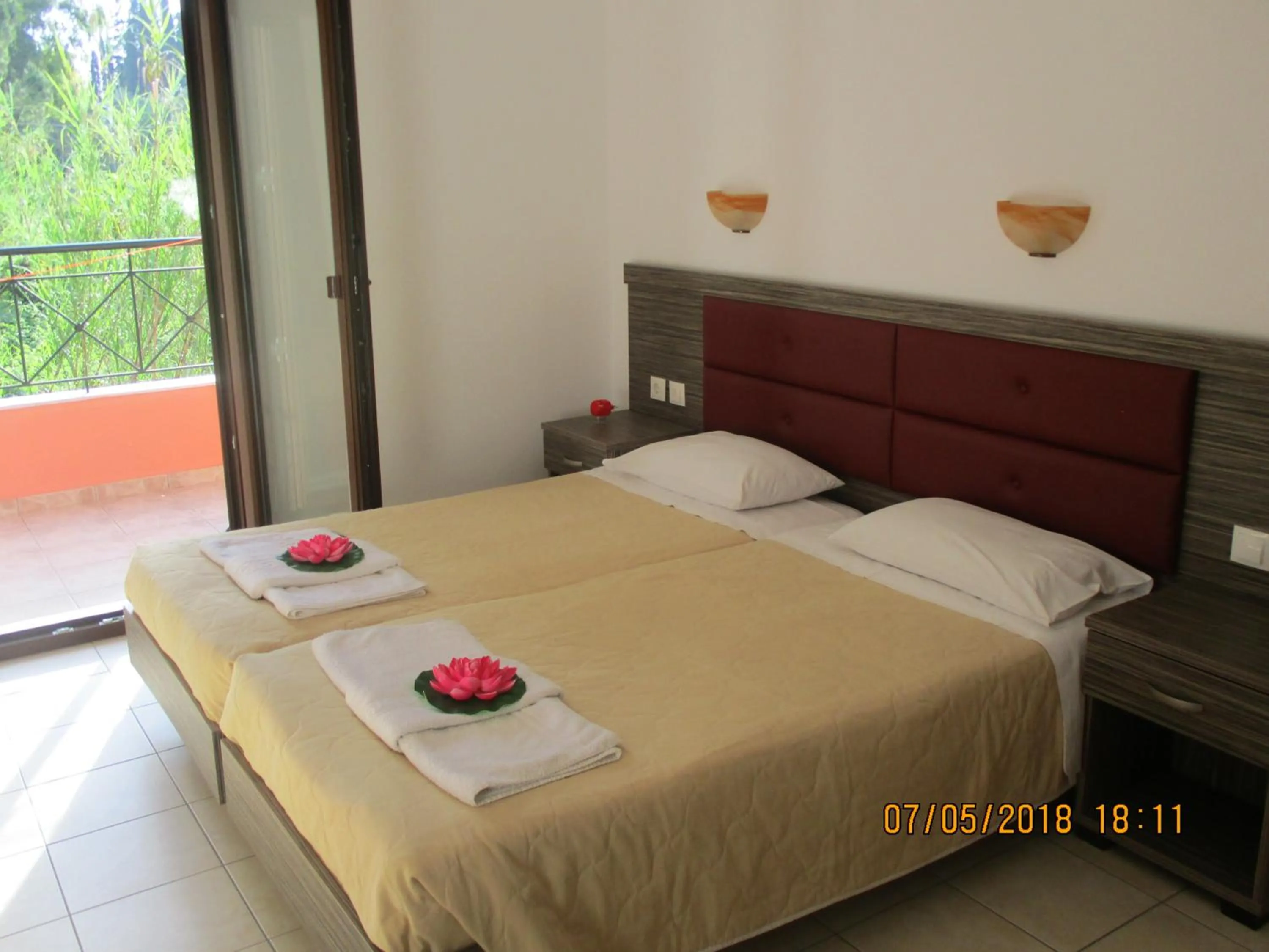 Bed in Gouvia House Luxury Apartments