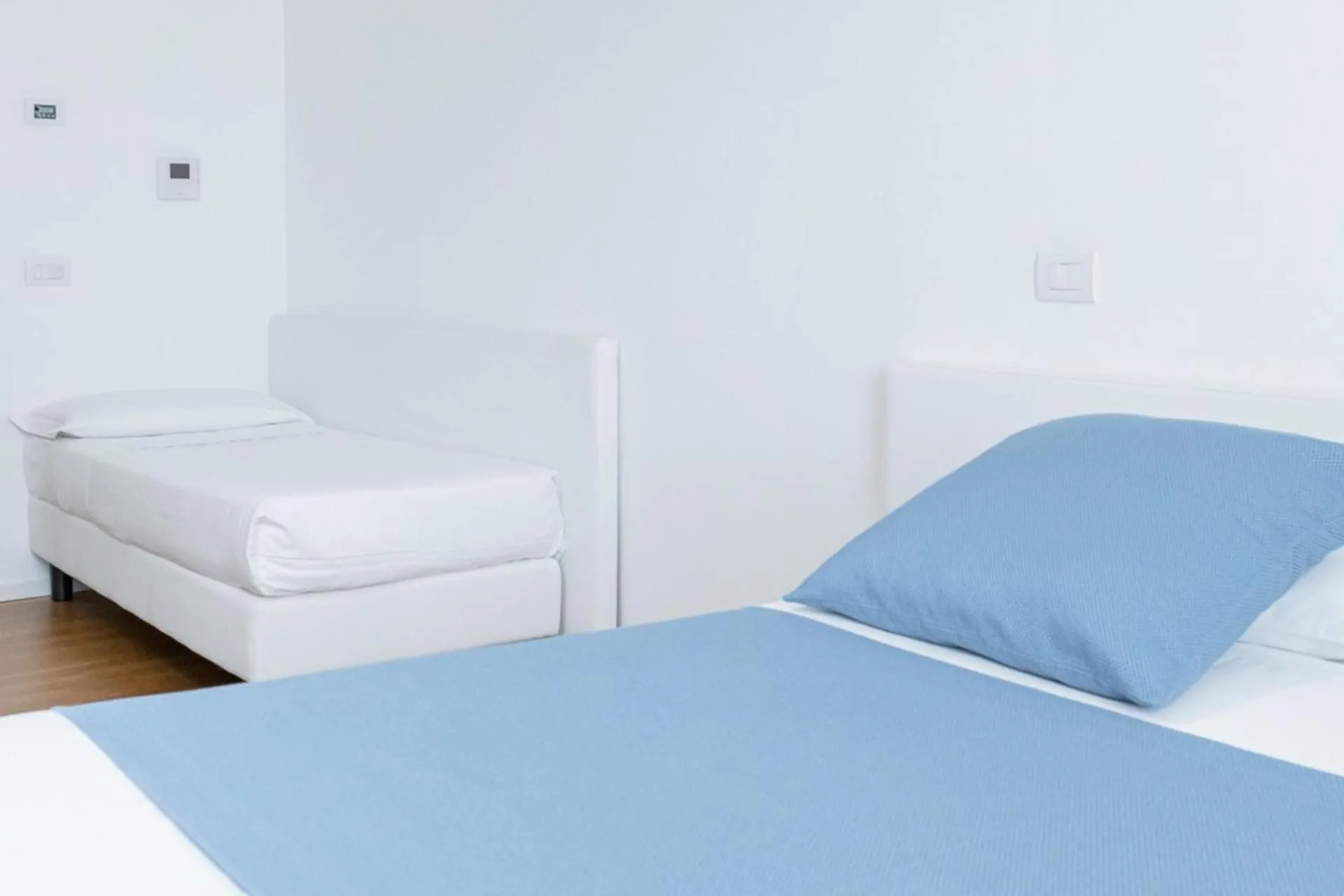 Bed in Felix Hotels - Residence Hotel Grandi Magazzini