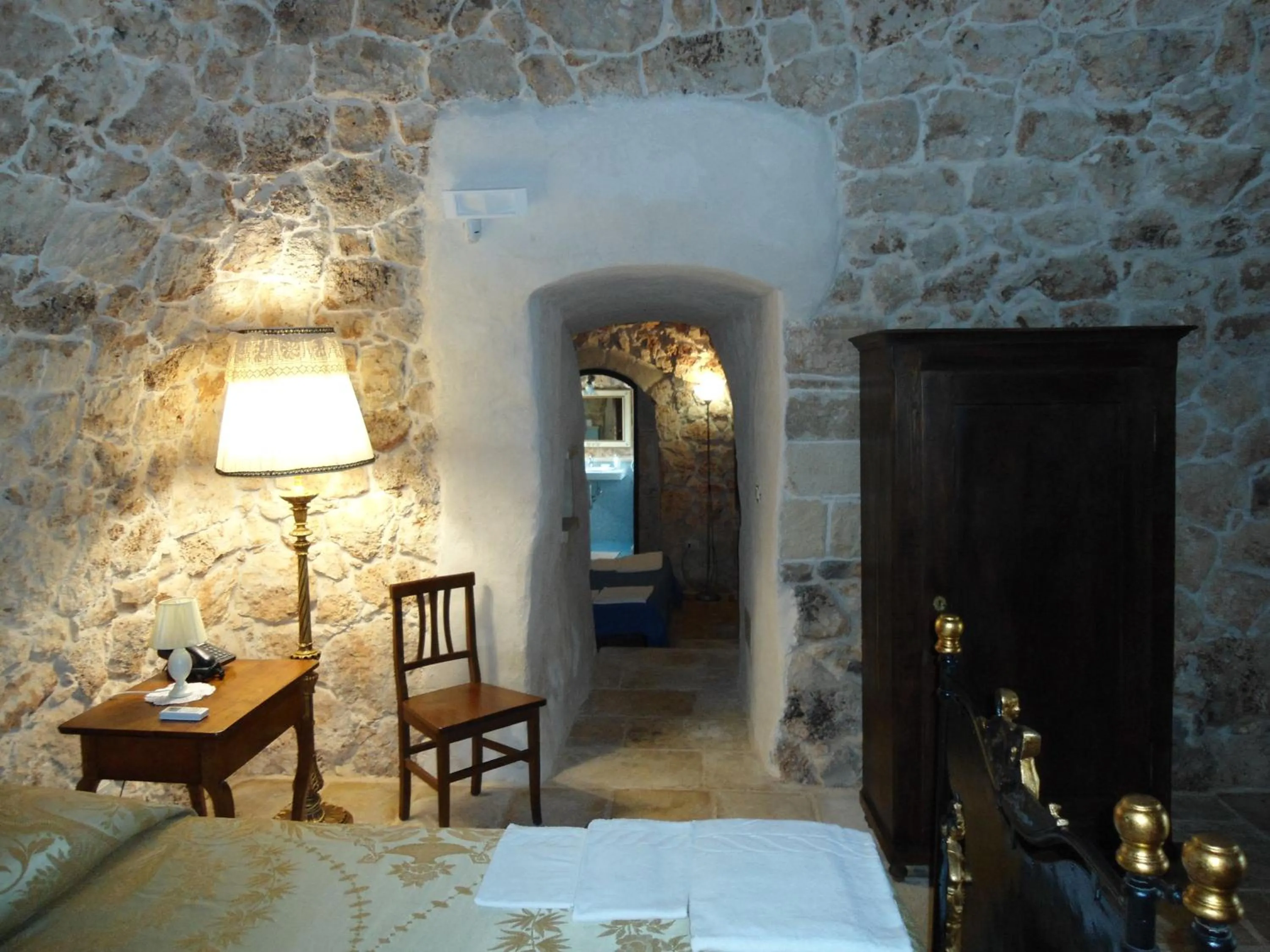 Decorative detail, Bed in Tenuta Pigliano Hotel