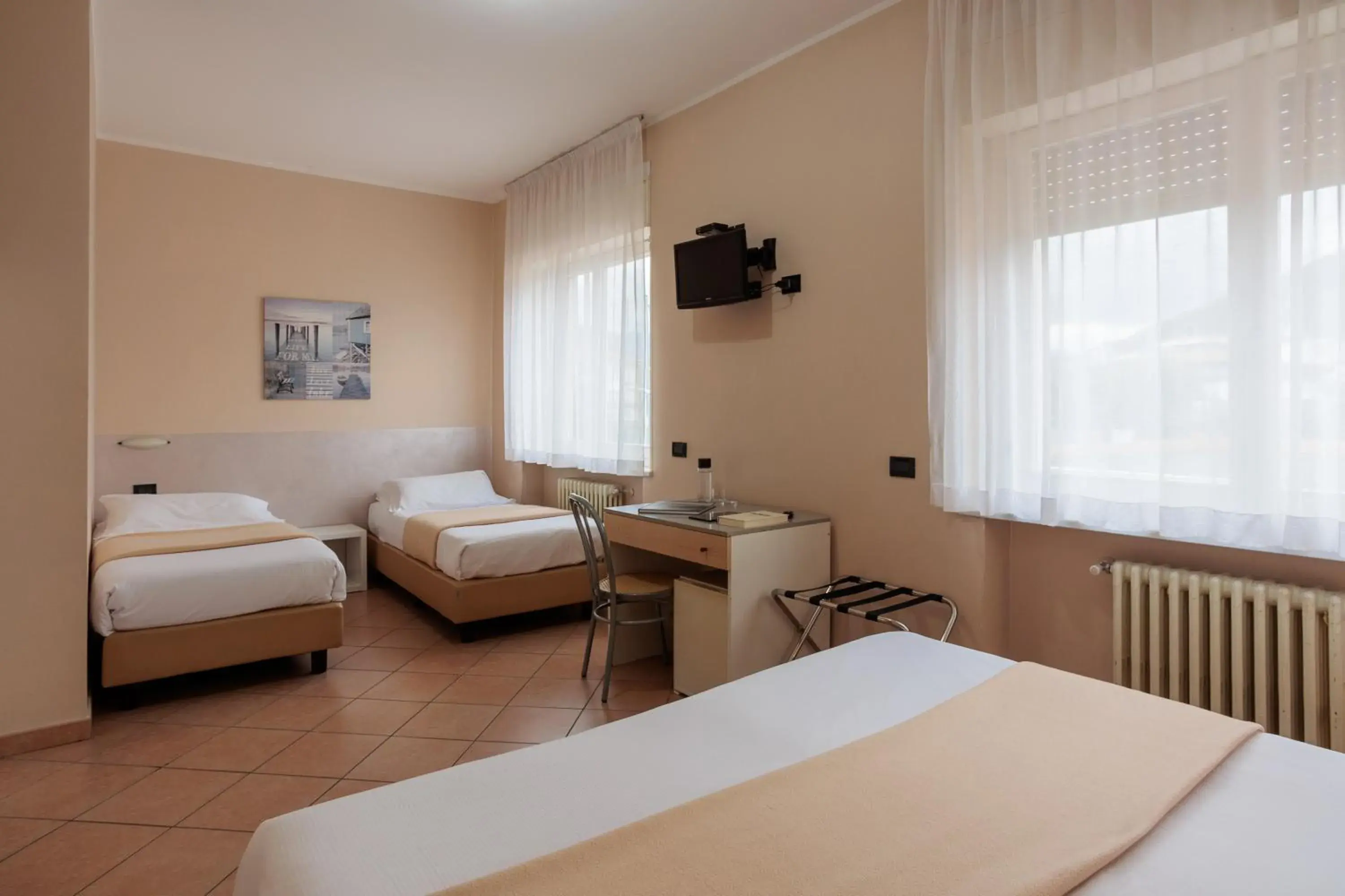 Quadruple Room in Al Centro Quadruple Room in Al Centro