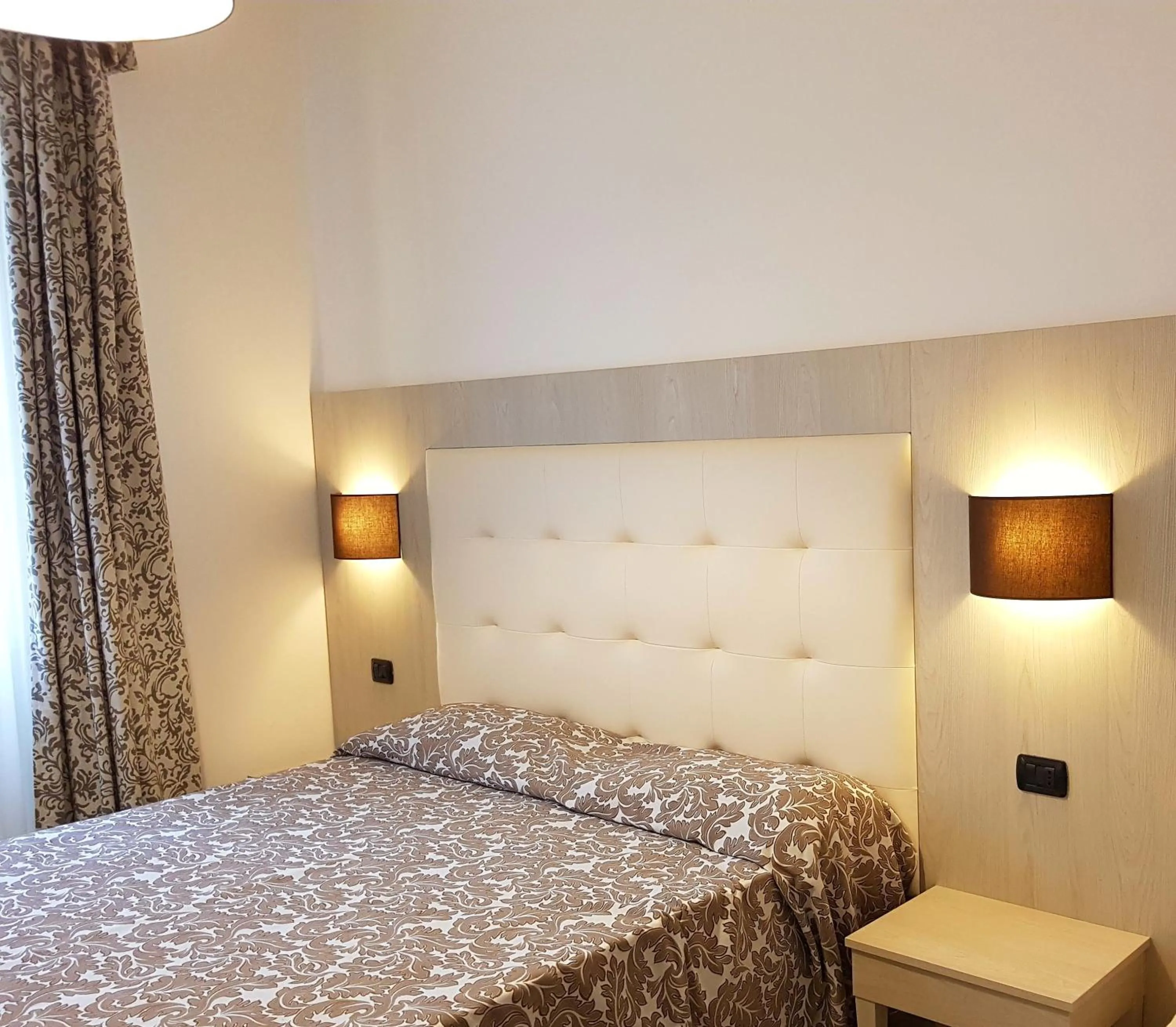 Bed in Albergo Degli Amici