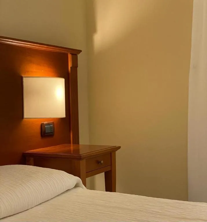 Bed in Albergo Degli Amici
