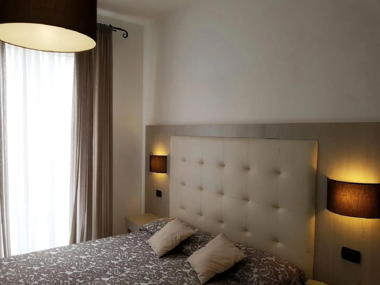 Bed in Albergo Degli Amici