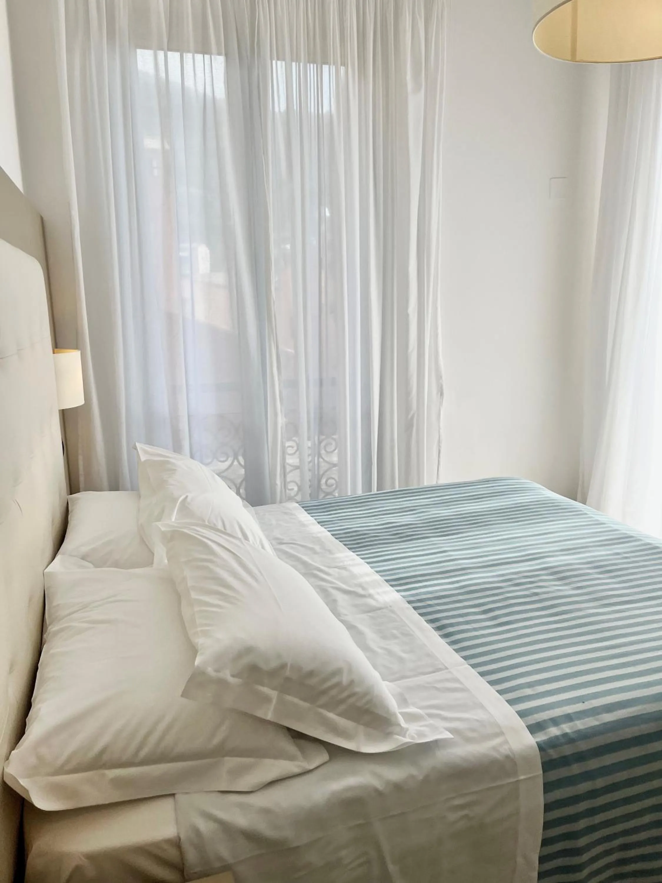 Bed in Albergo Degli Amici
