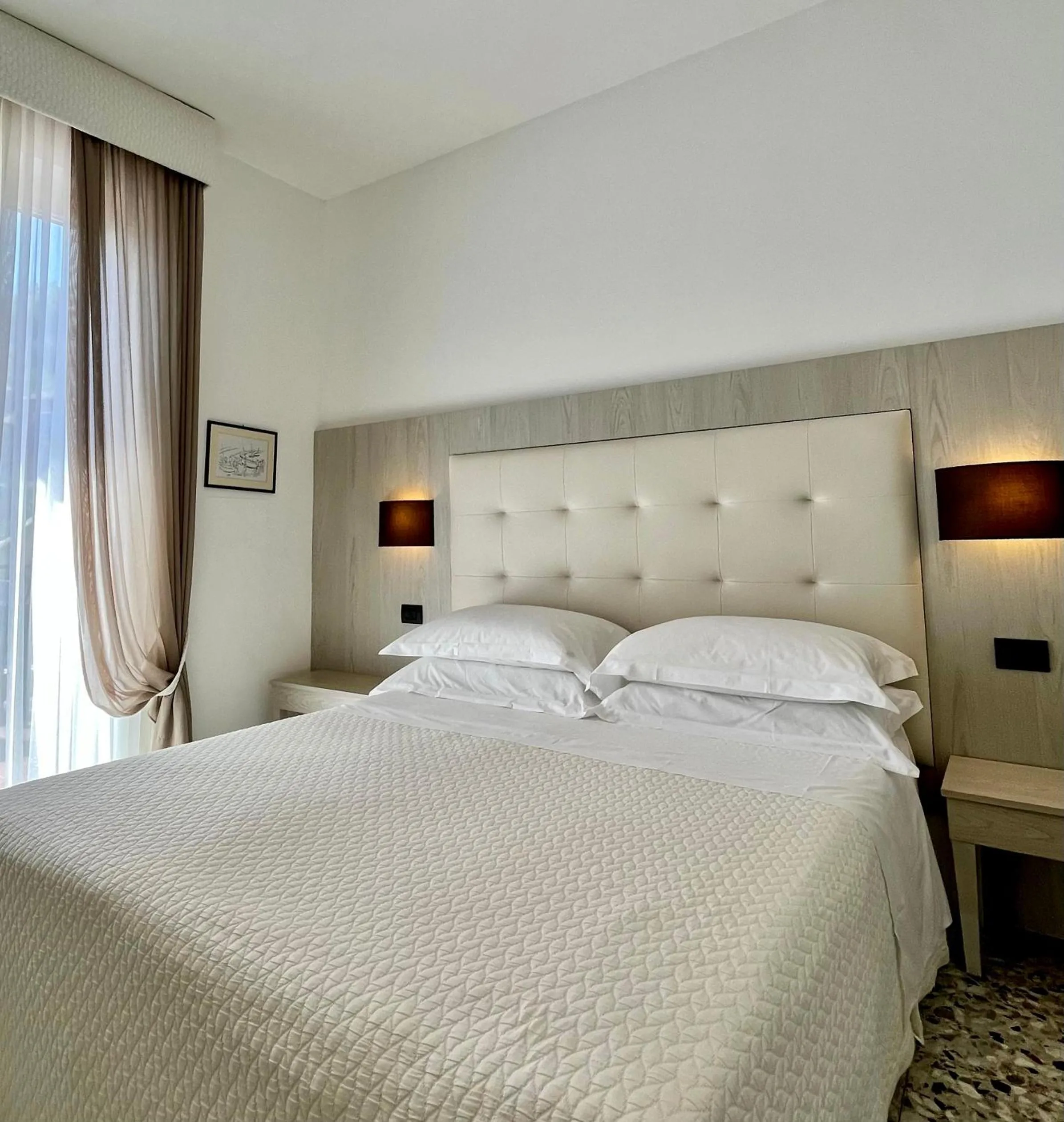 Bed in Albergo Degli Amici