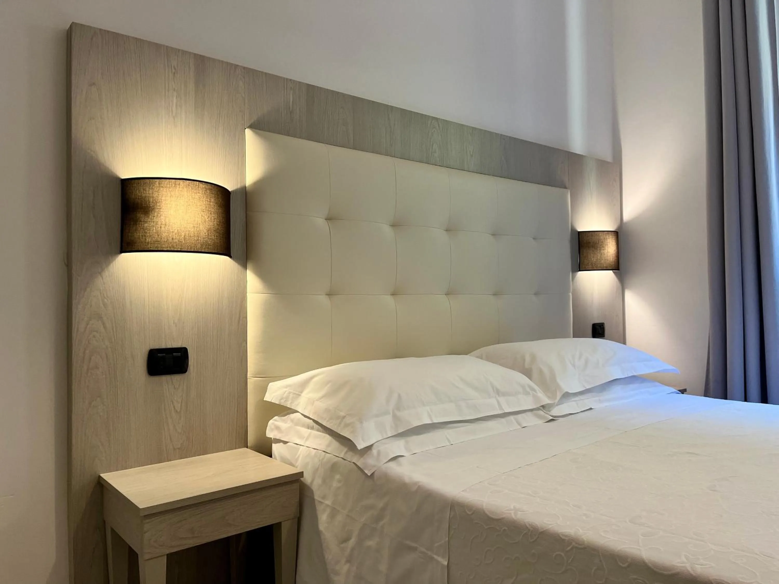 Bed in Albergo Degli Amici
