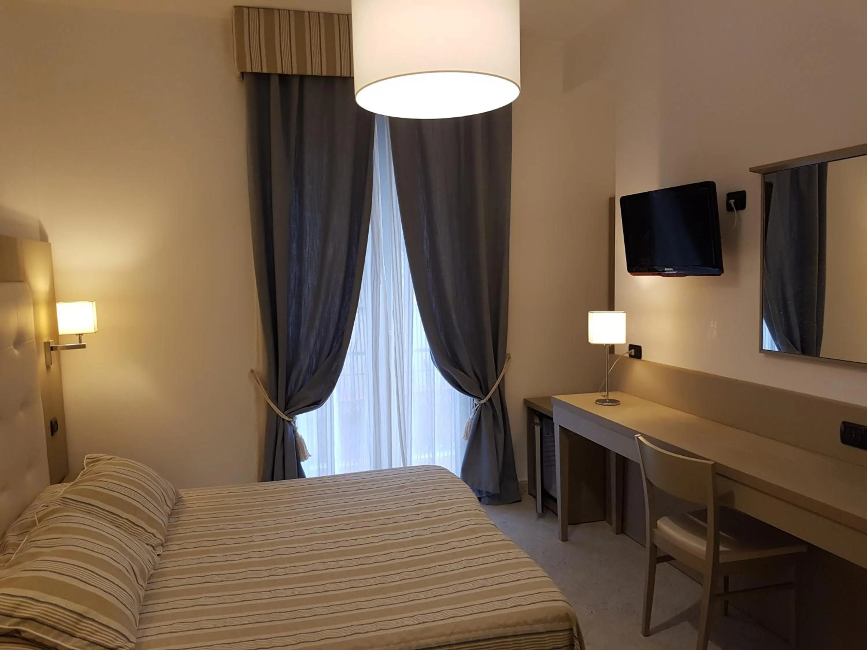 Bed in Albergo Degli Amici