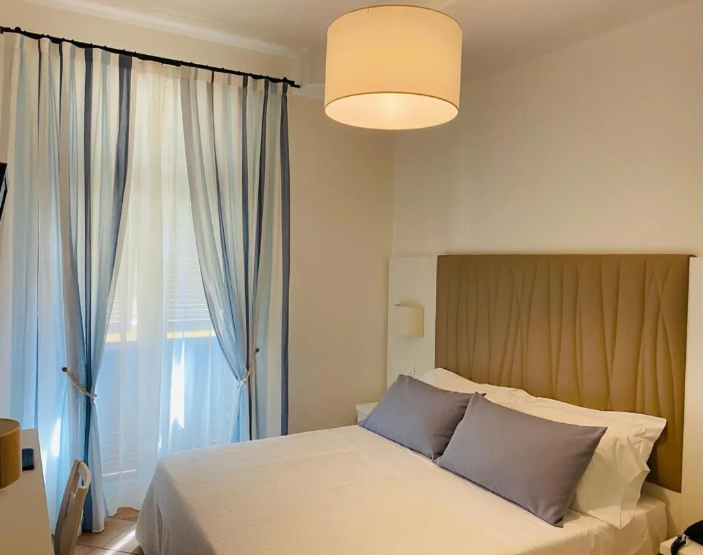 Bed in Albergo Degli Amici