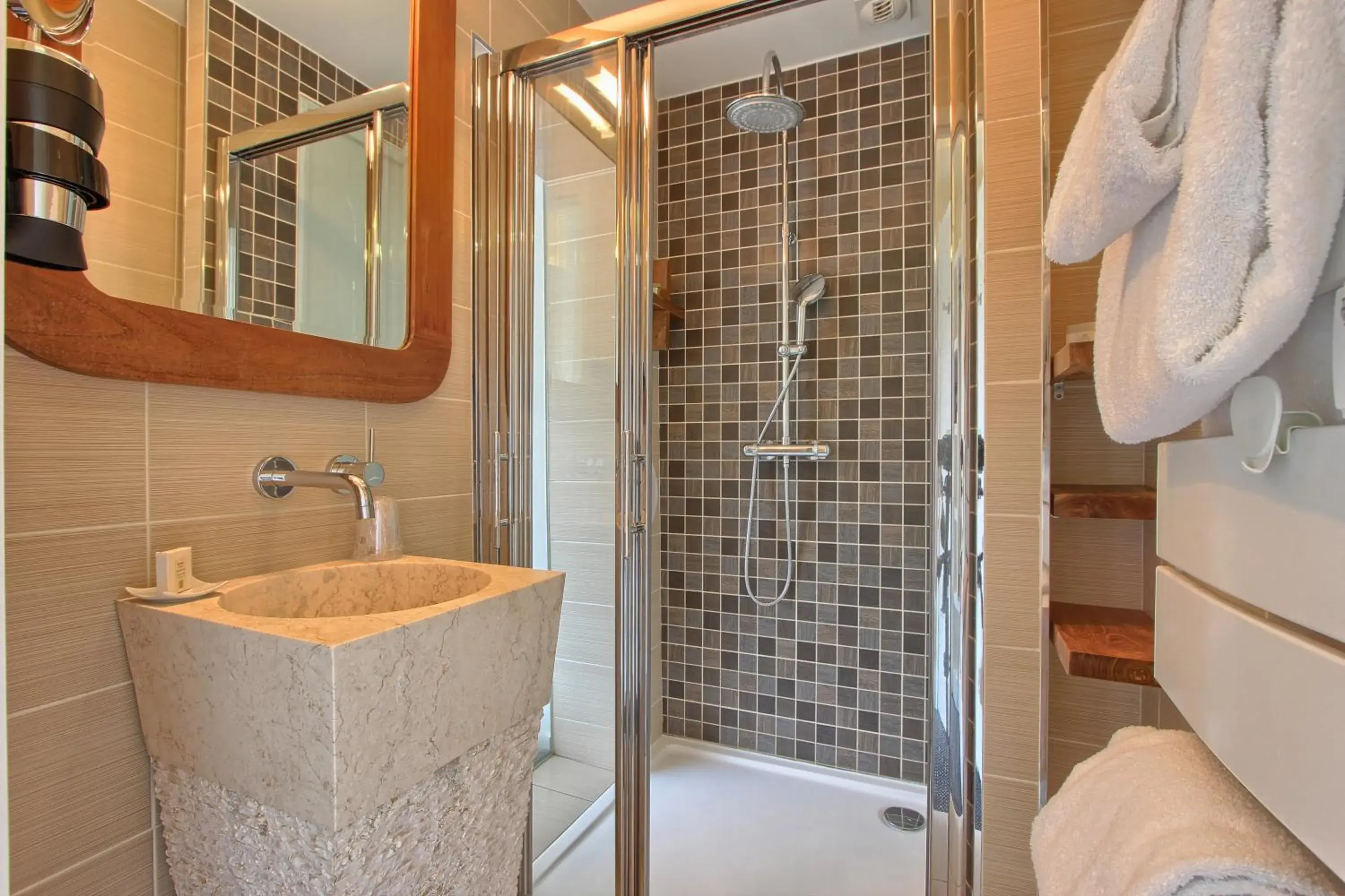 Shower, Bathroom in Logis le Manoir de Sauvegrain