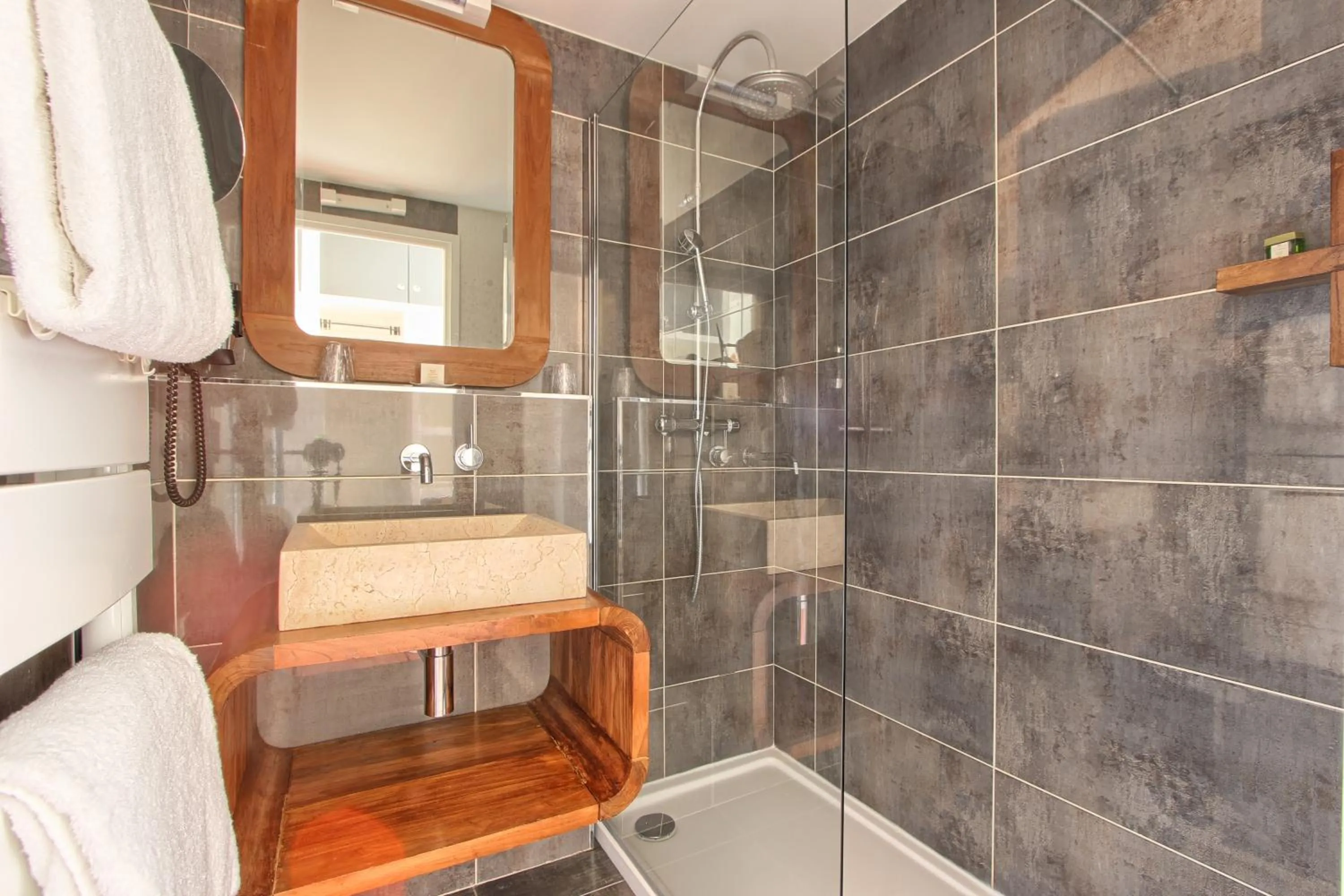 Bathroom in Logis Hôtel - Le Manoir de Sauvegrain