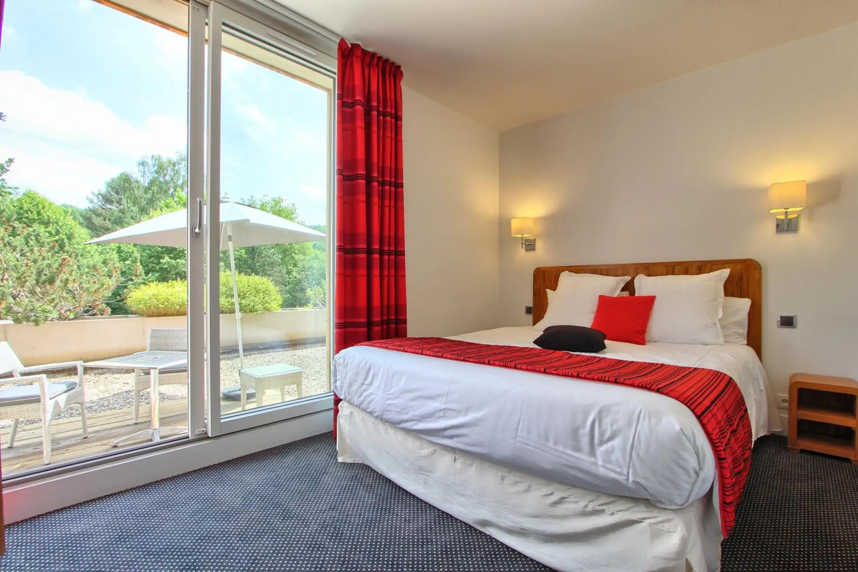 Photo of the whole room, Bed in Logis le Manoir de Sauvegrain