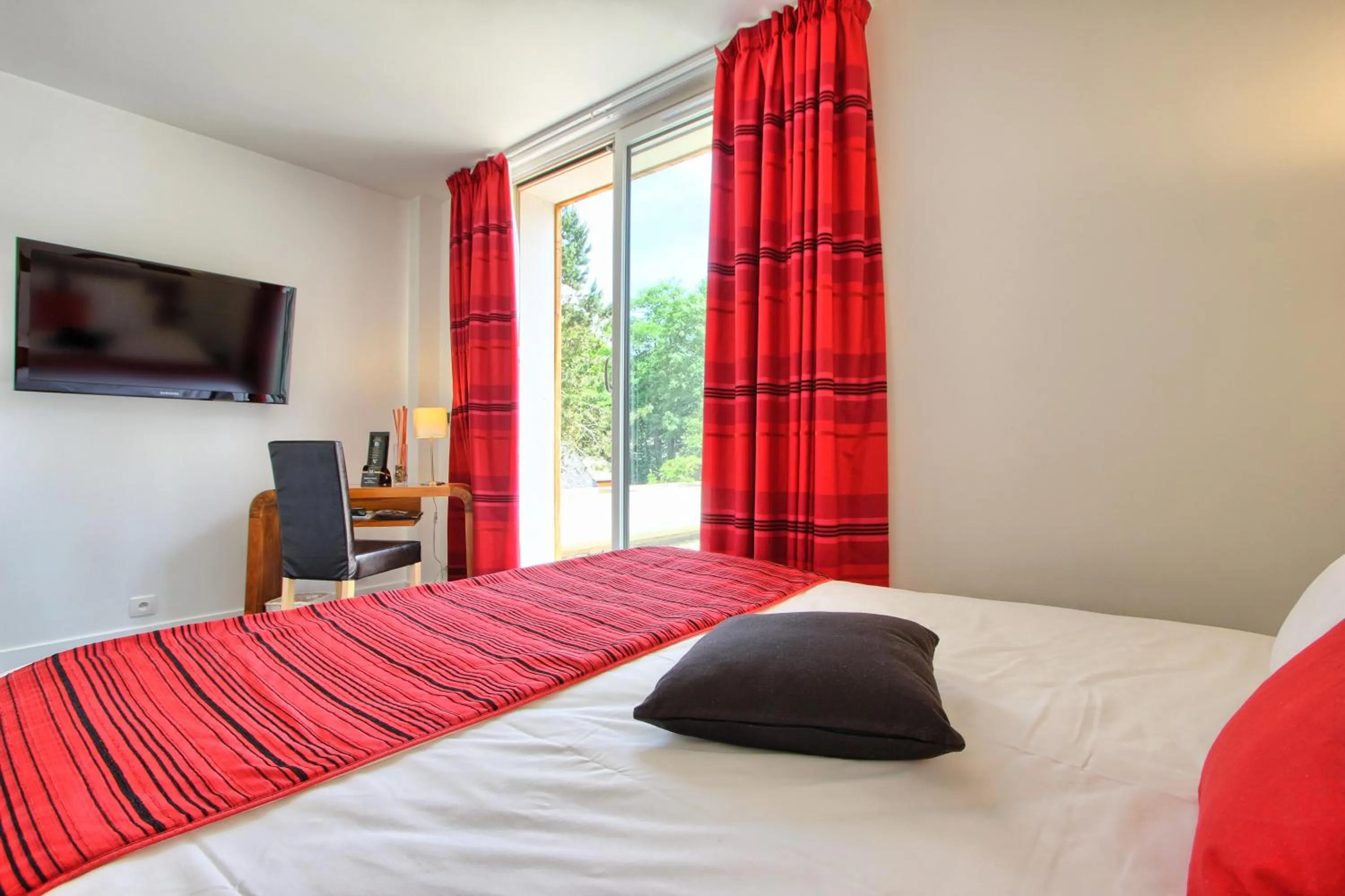 Photo of the whole room, Bed in Logis Hôtel - Le Manoir de Sauvegrain