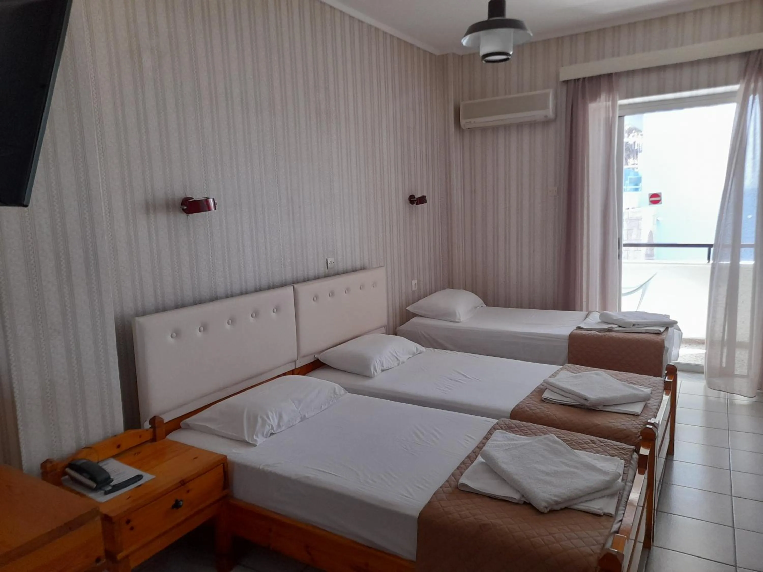 Photo of the whole room, Bed in Phaethon Hotel