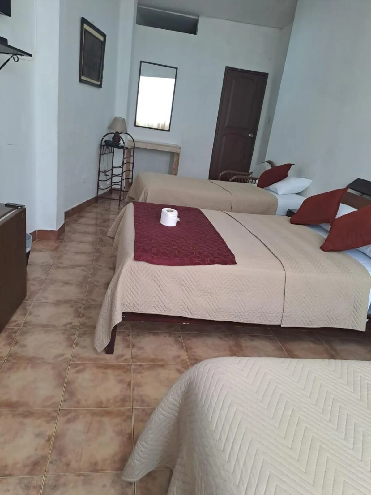 Bed in Atlantic Suites Hotel