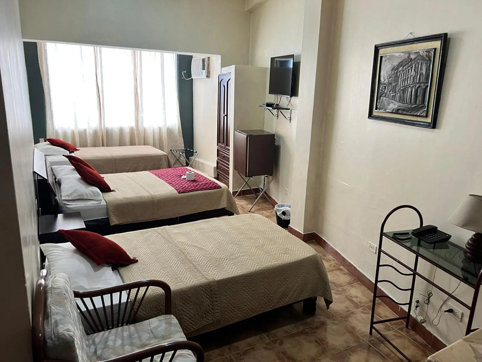 Bed in Atlantic Suites Hotel