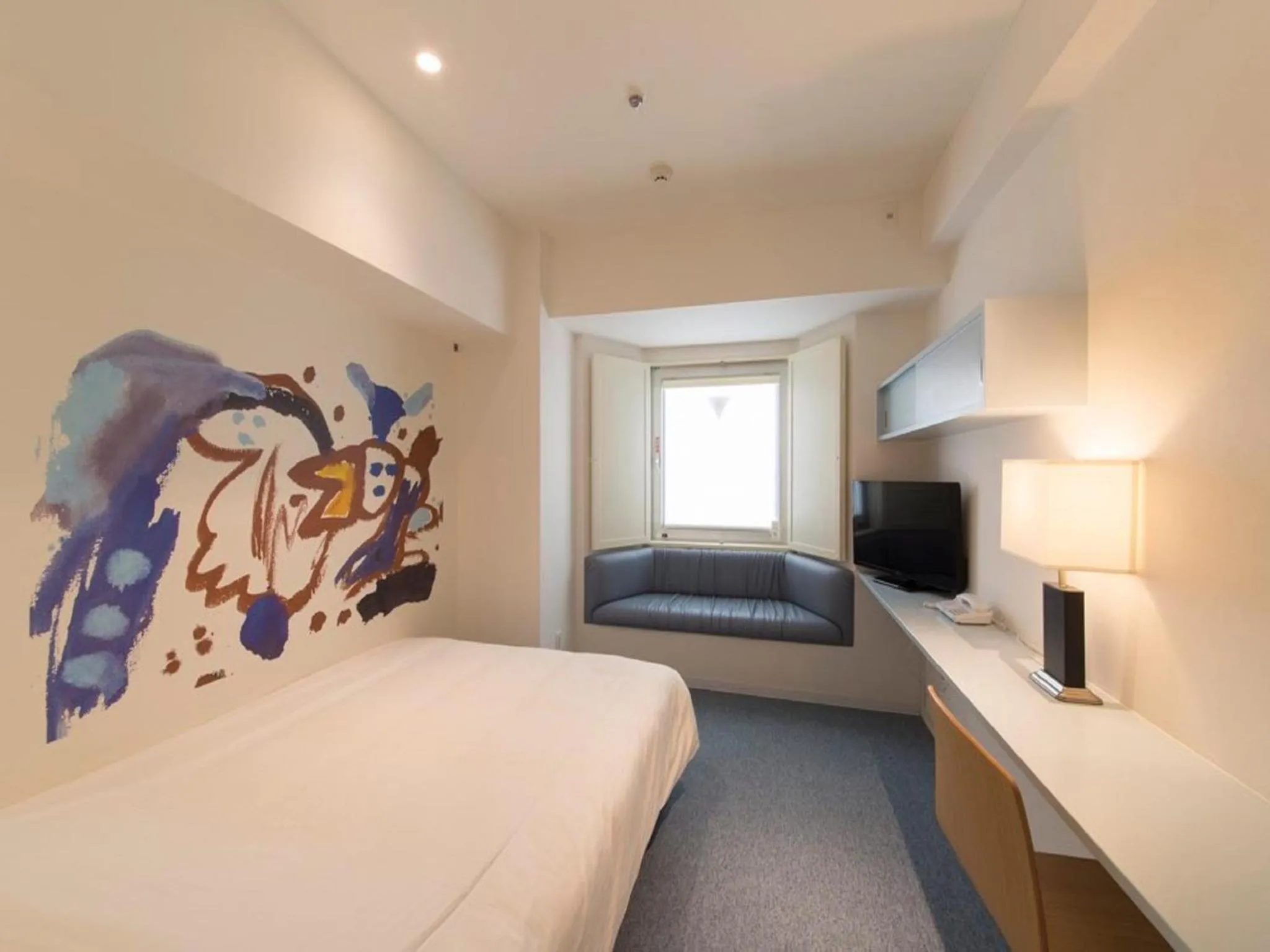 Photo of the whole room, Bed in Hotel Art Stay Naha Kokusai-Dori