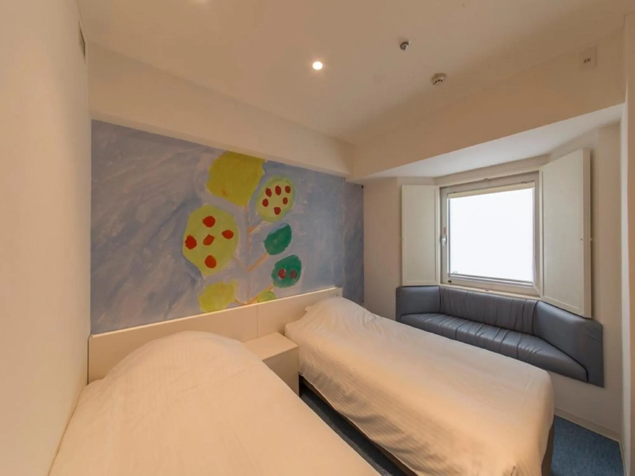 Photo of the whole room, Bed in Hotel Art Stay Naha Kokusai-Dori