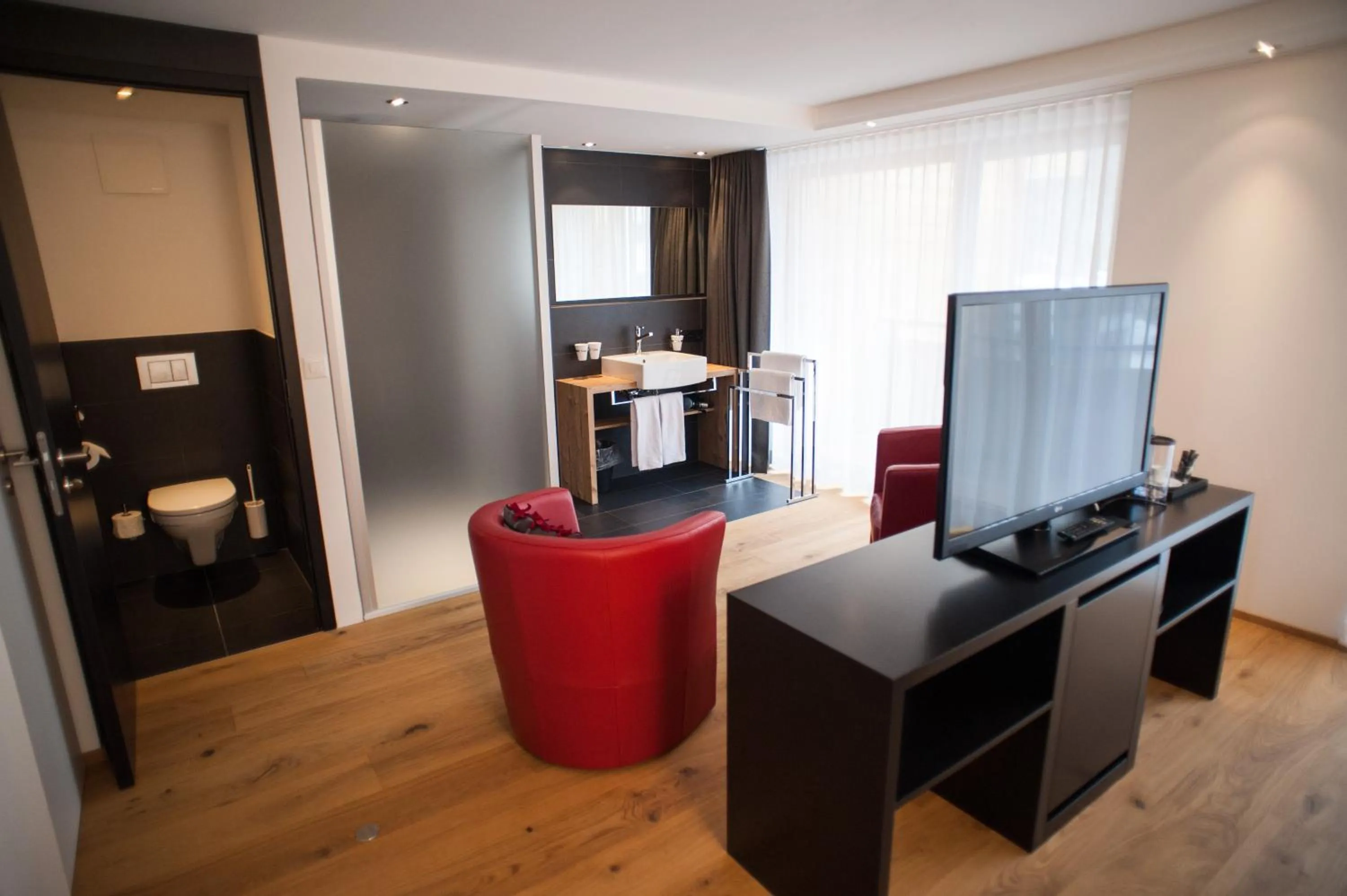 Seating area in Elite Alpine Lodge - Apart & Breakfast