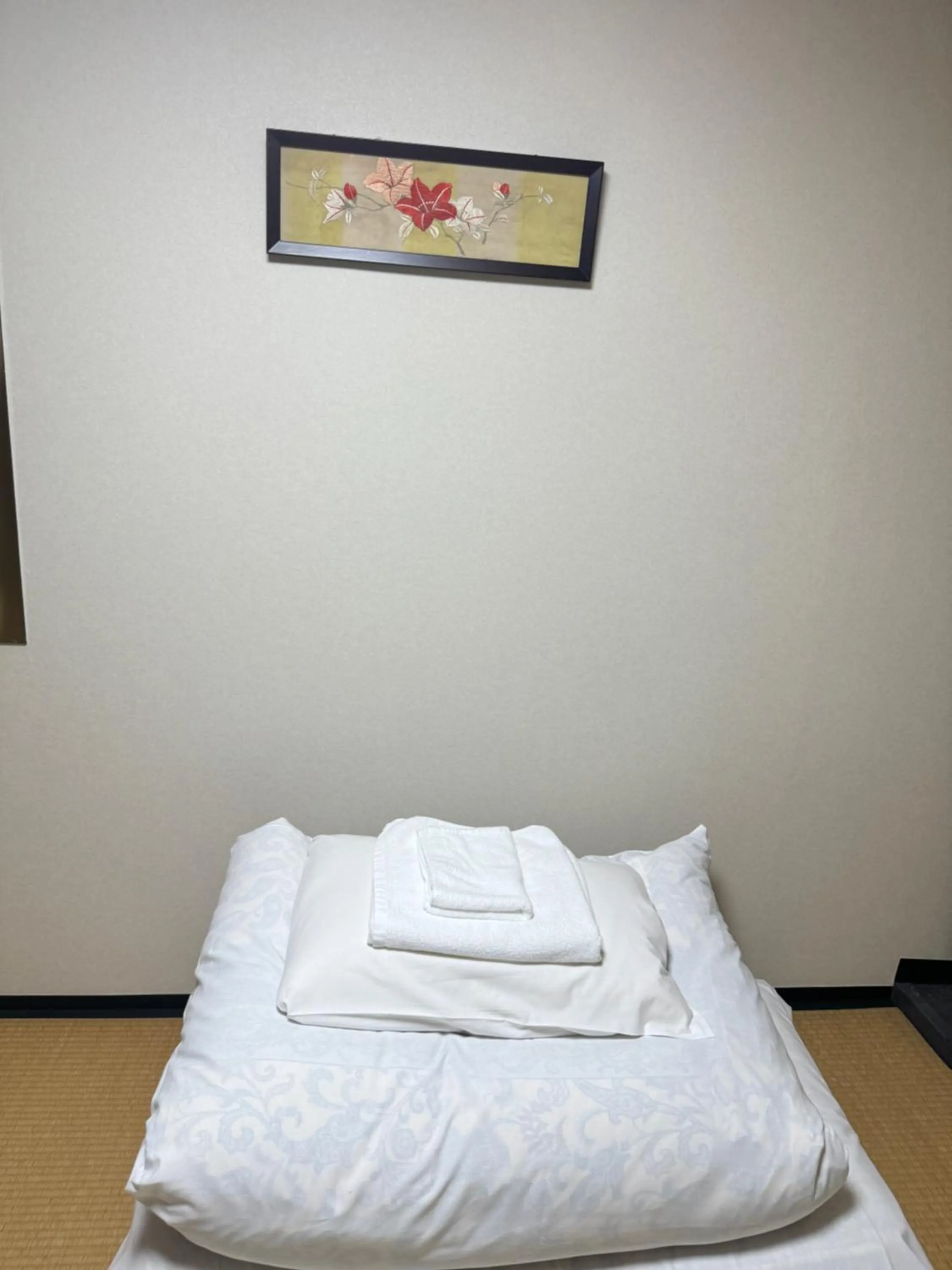 Bed in Ikoi-no-Ie Guesthouse