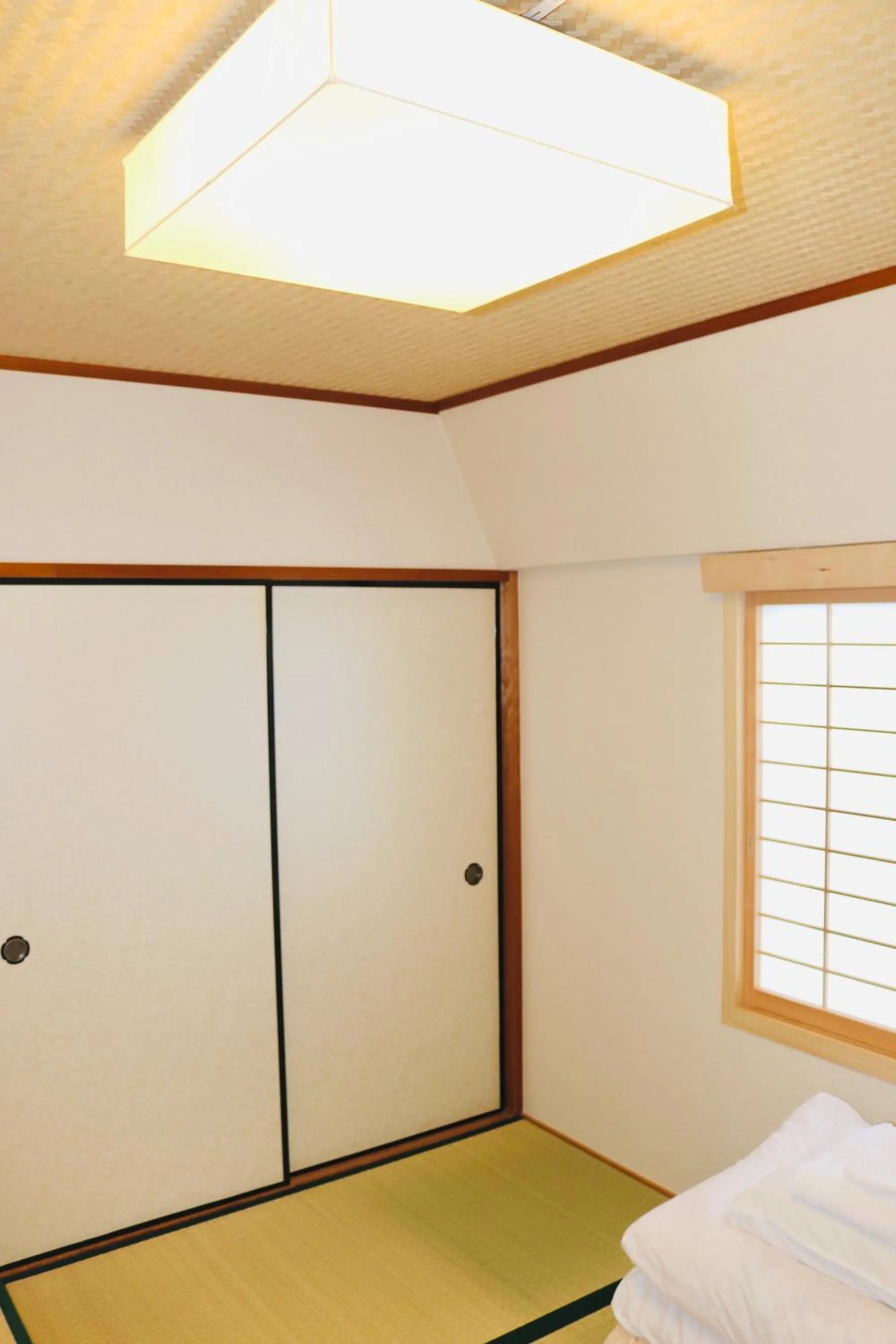 Bed in Ikoi-no-Ie Guesthouse