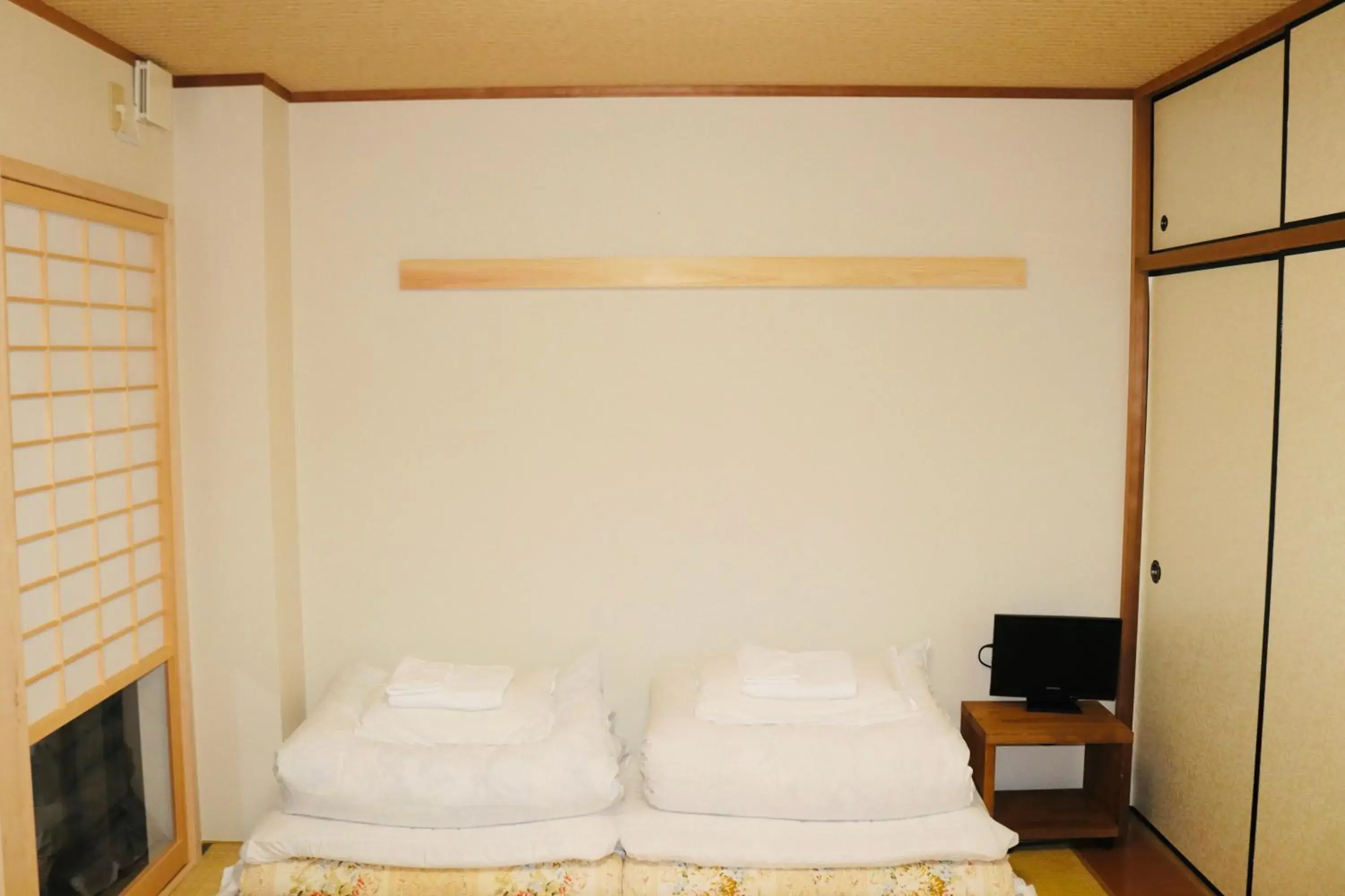 Bed in Ikoi-no-Ie Guesthouse Bed in Ikoi-no-Ie Guesthouse