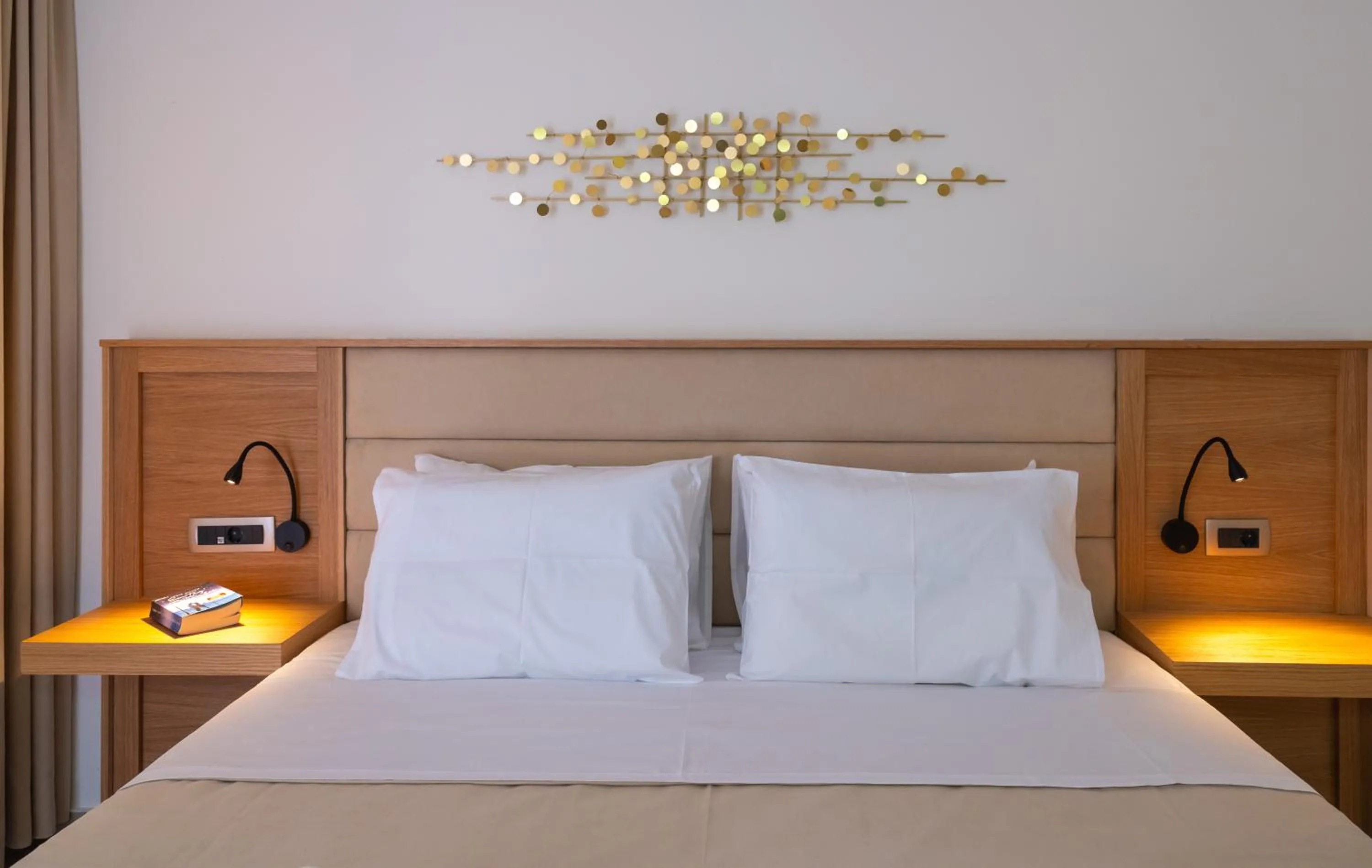 Bed in Calypso Hotel