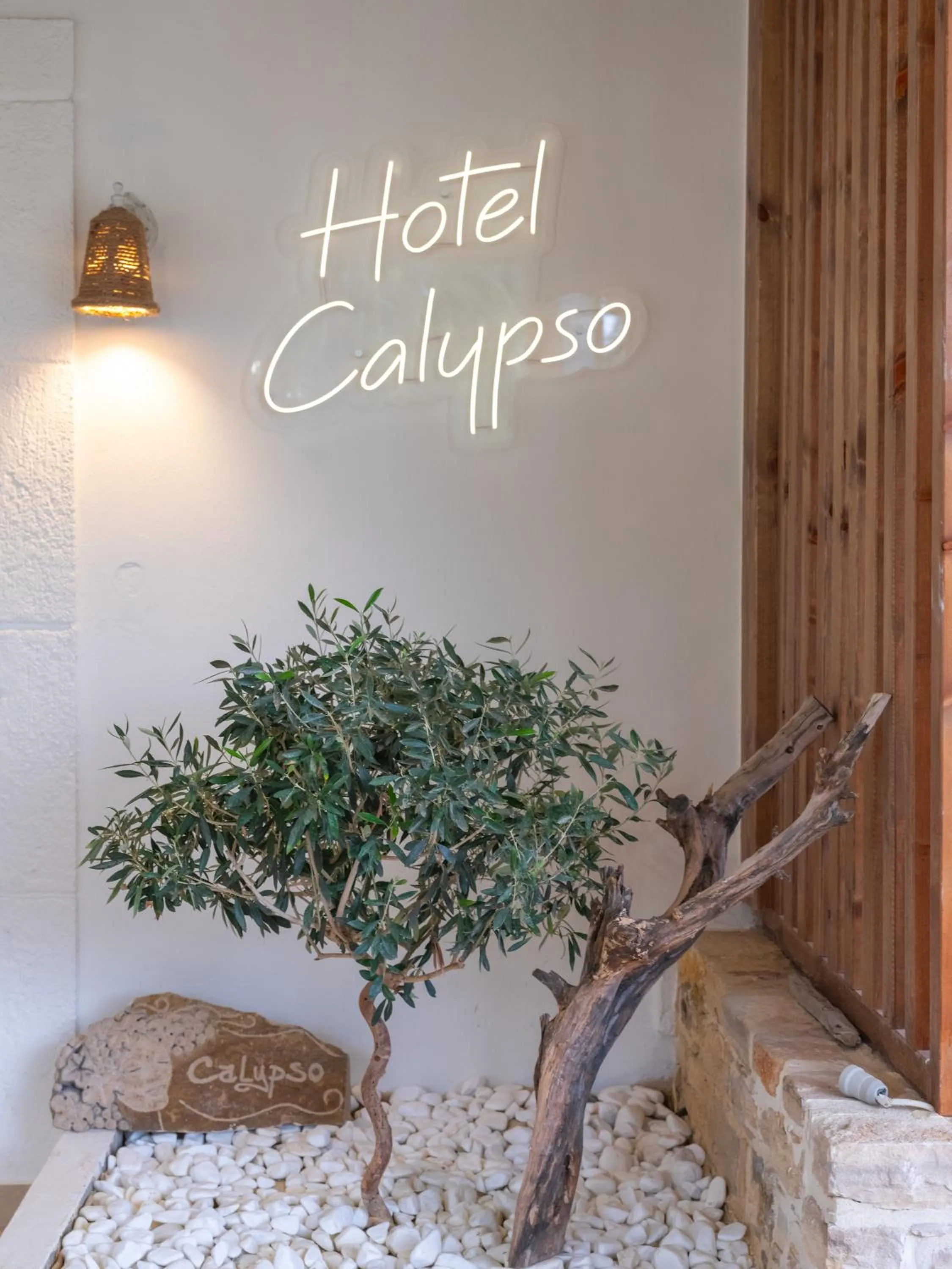 Property logo or sign in Calypso Hotel