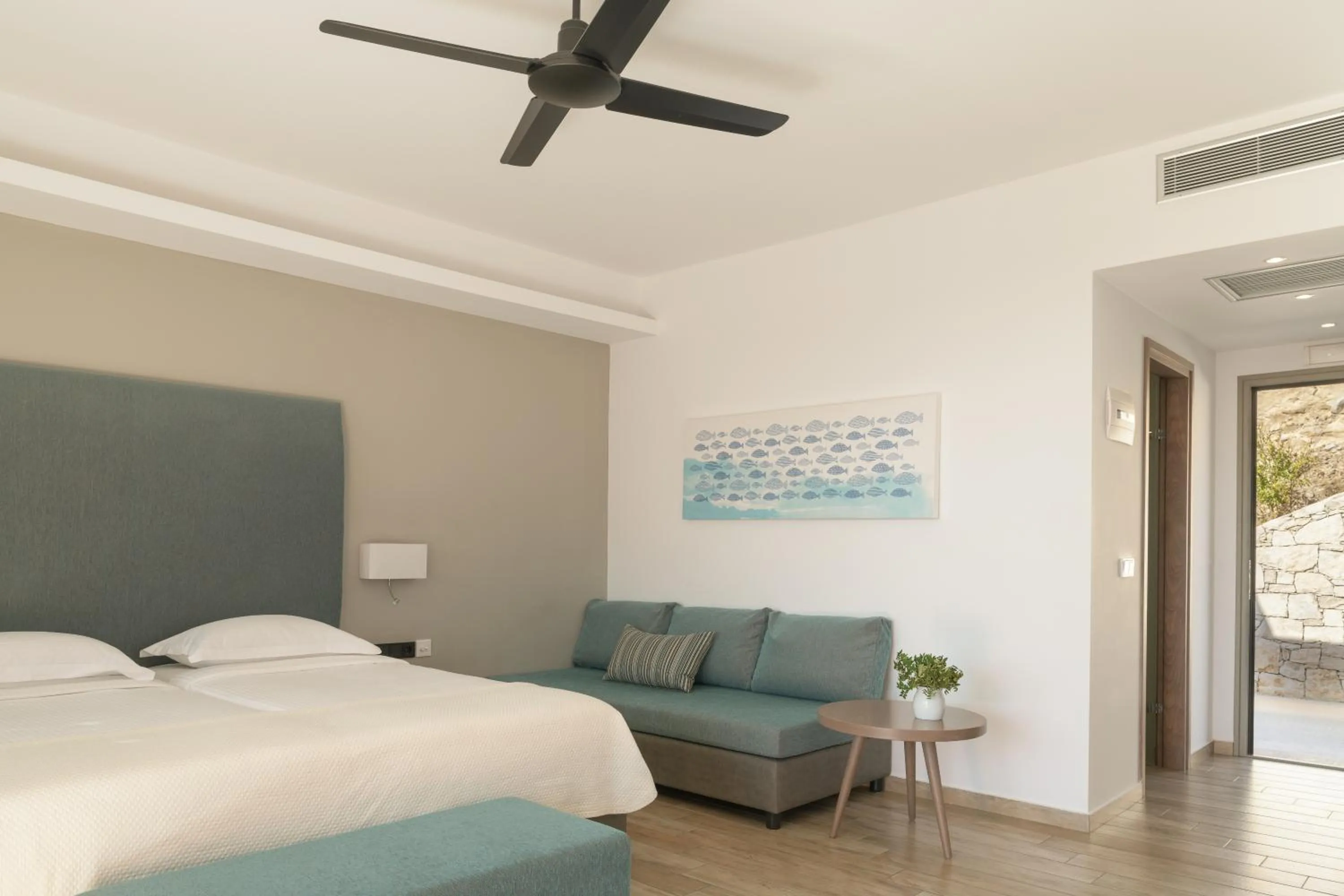 fireplace, Bed in Paralos Irini Mare