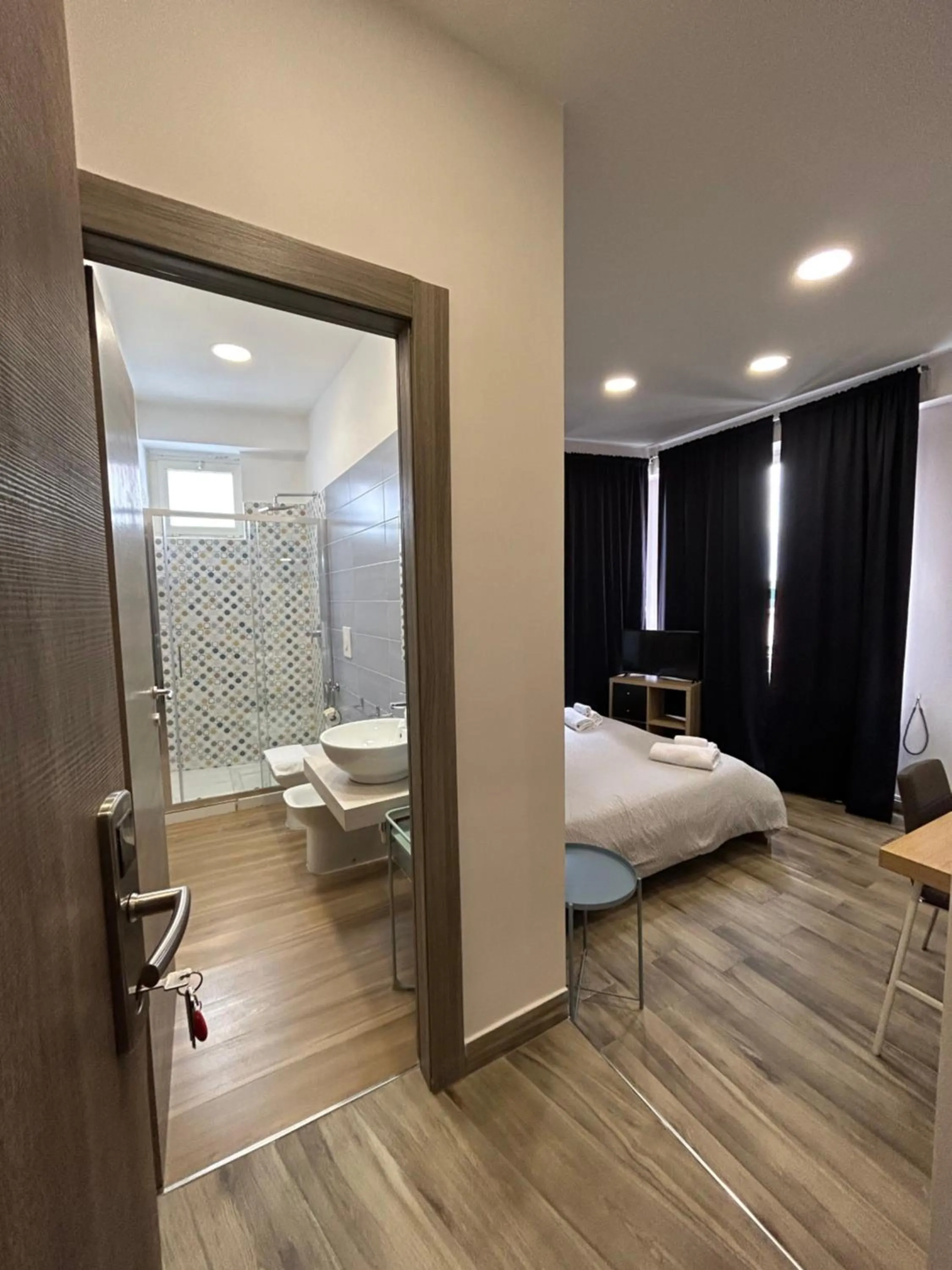 Bed in 2Naples Rooms