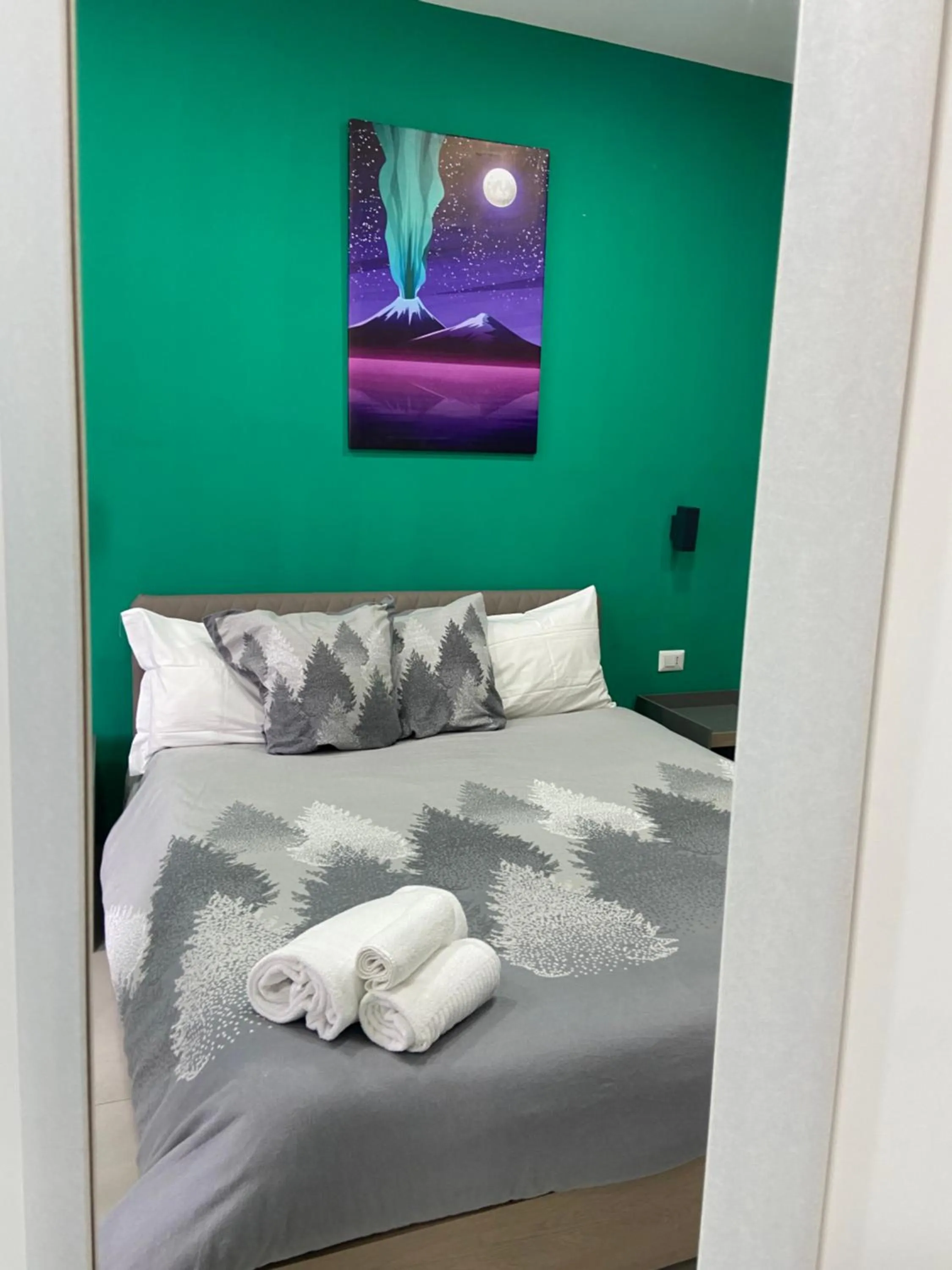 Bed in 2Naples Rooms