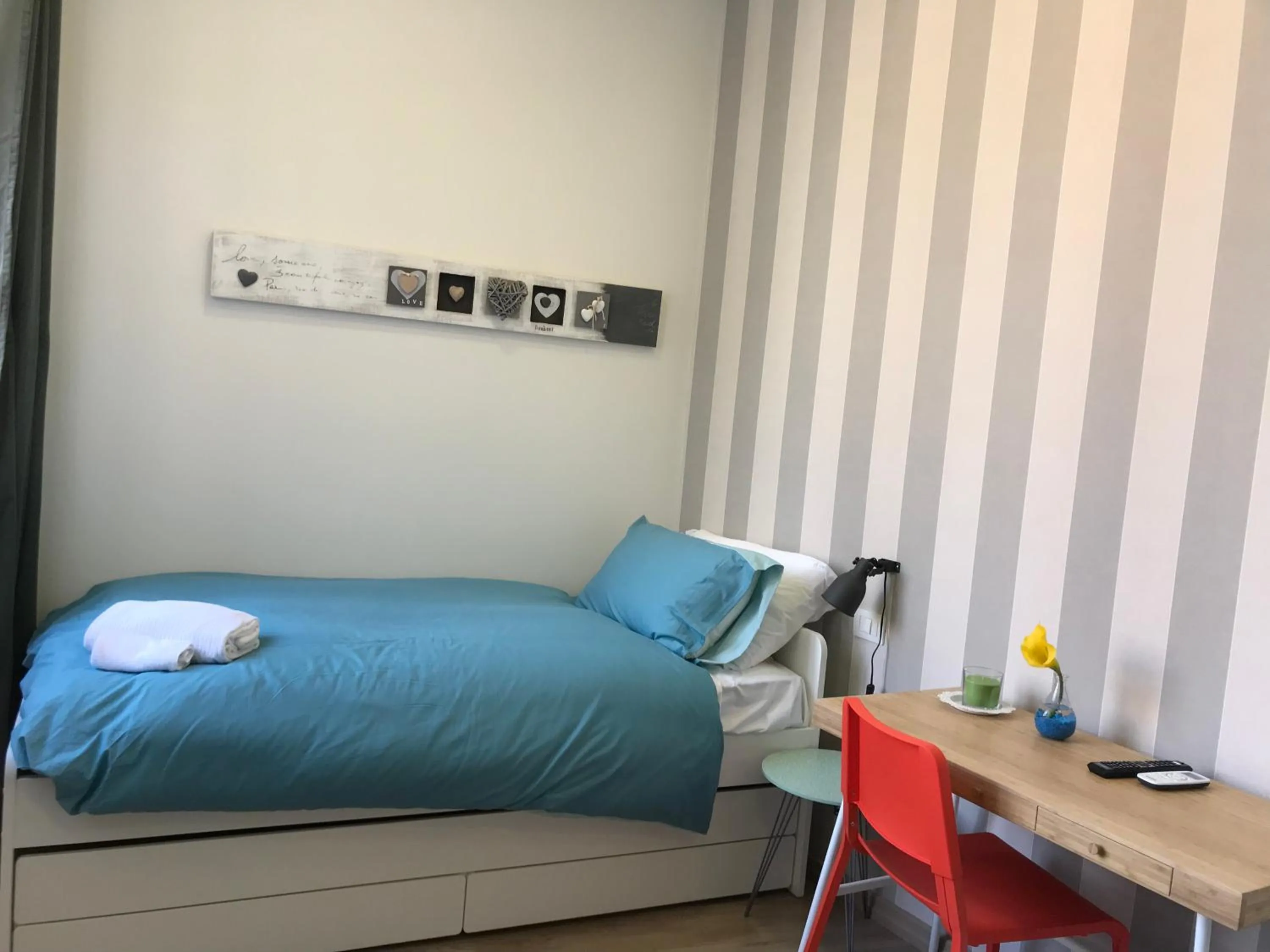 Bed in 2Naples Rooms