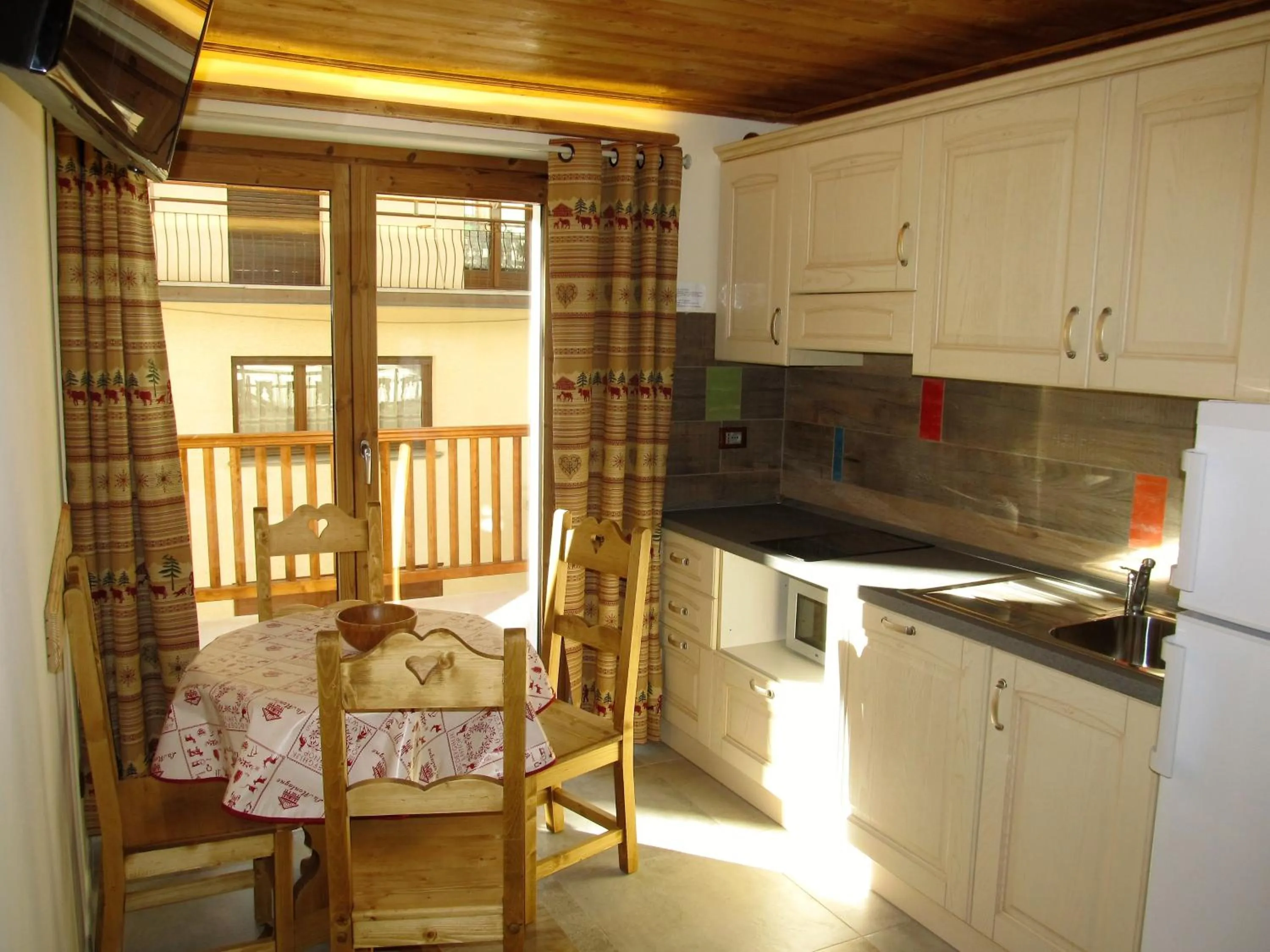 Kitchen or kitchenette in Miramonti