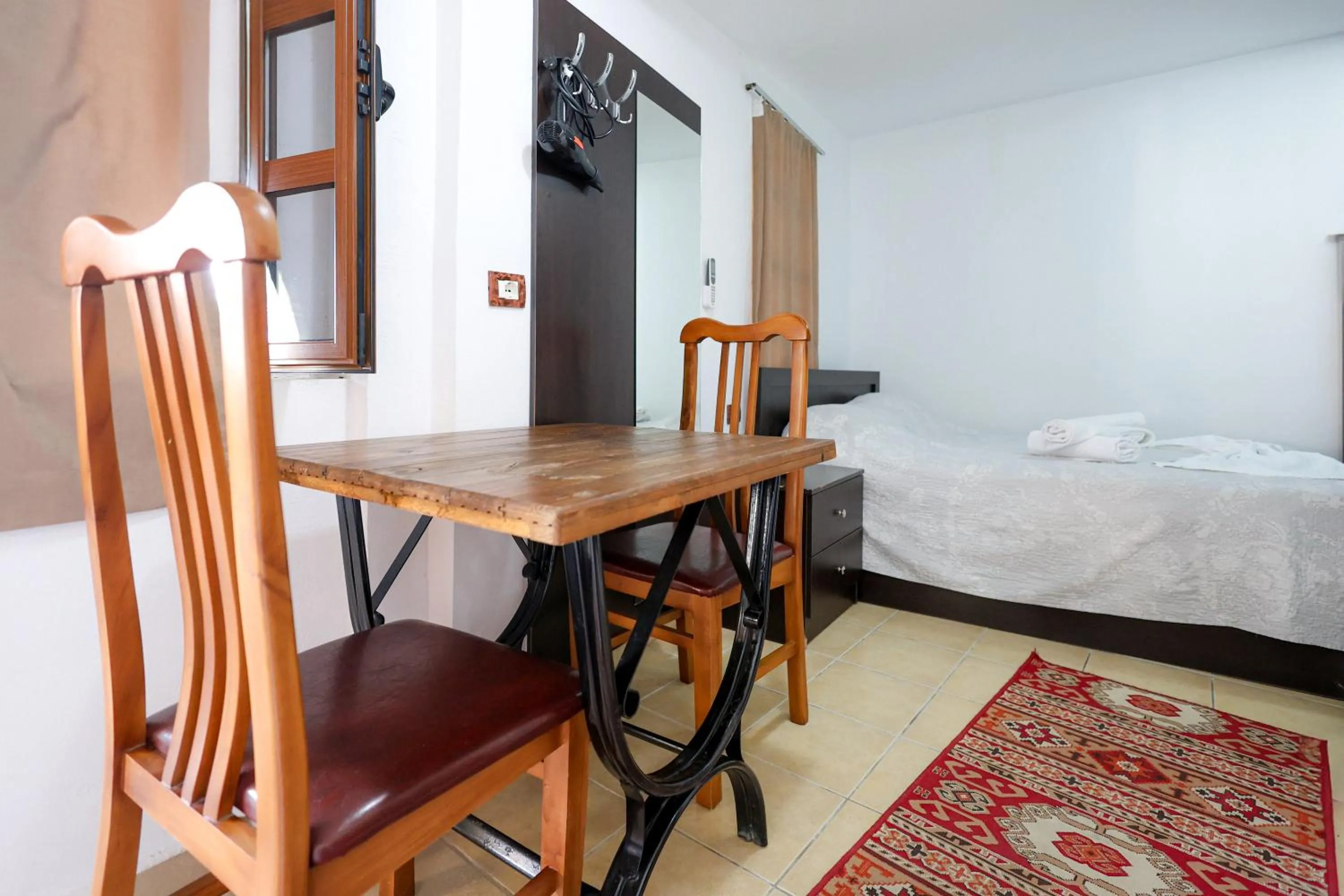 Seating area, Bed in Hotel Ajka