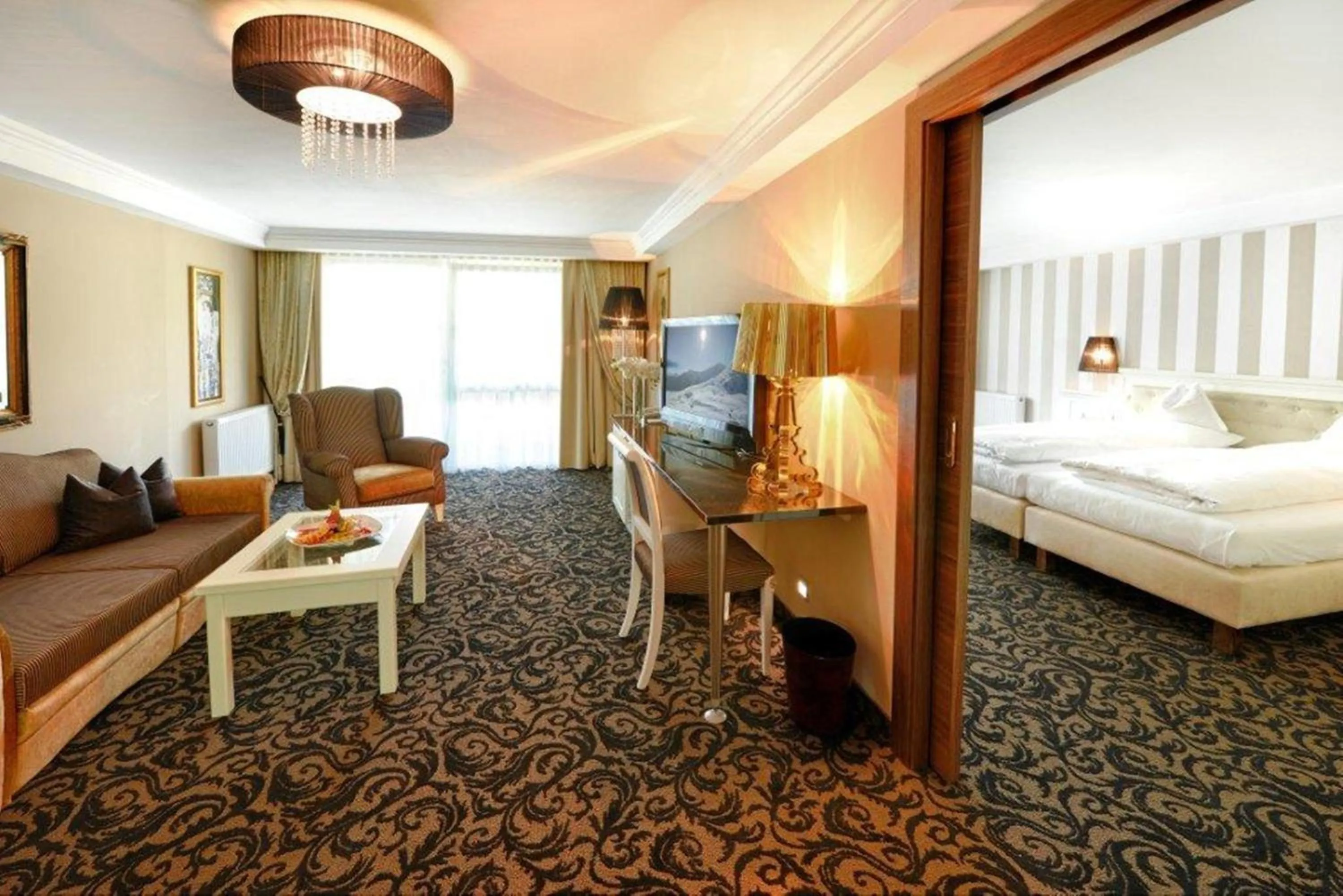 Living room, Bed in Wellnesshotel Cervosa