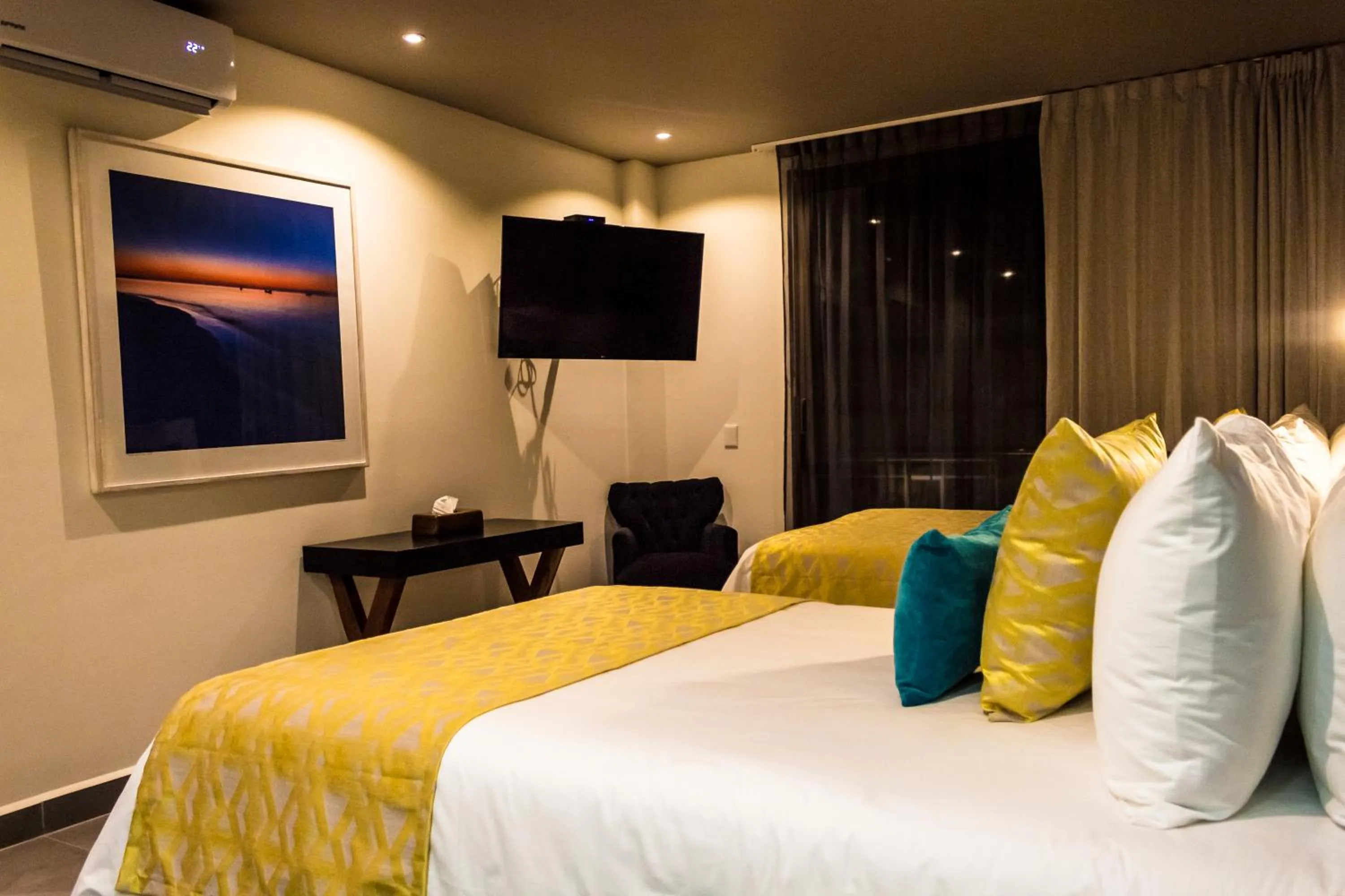 Photo of the whole room, Bed in KABAH Cancun Hotel Boutique