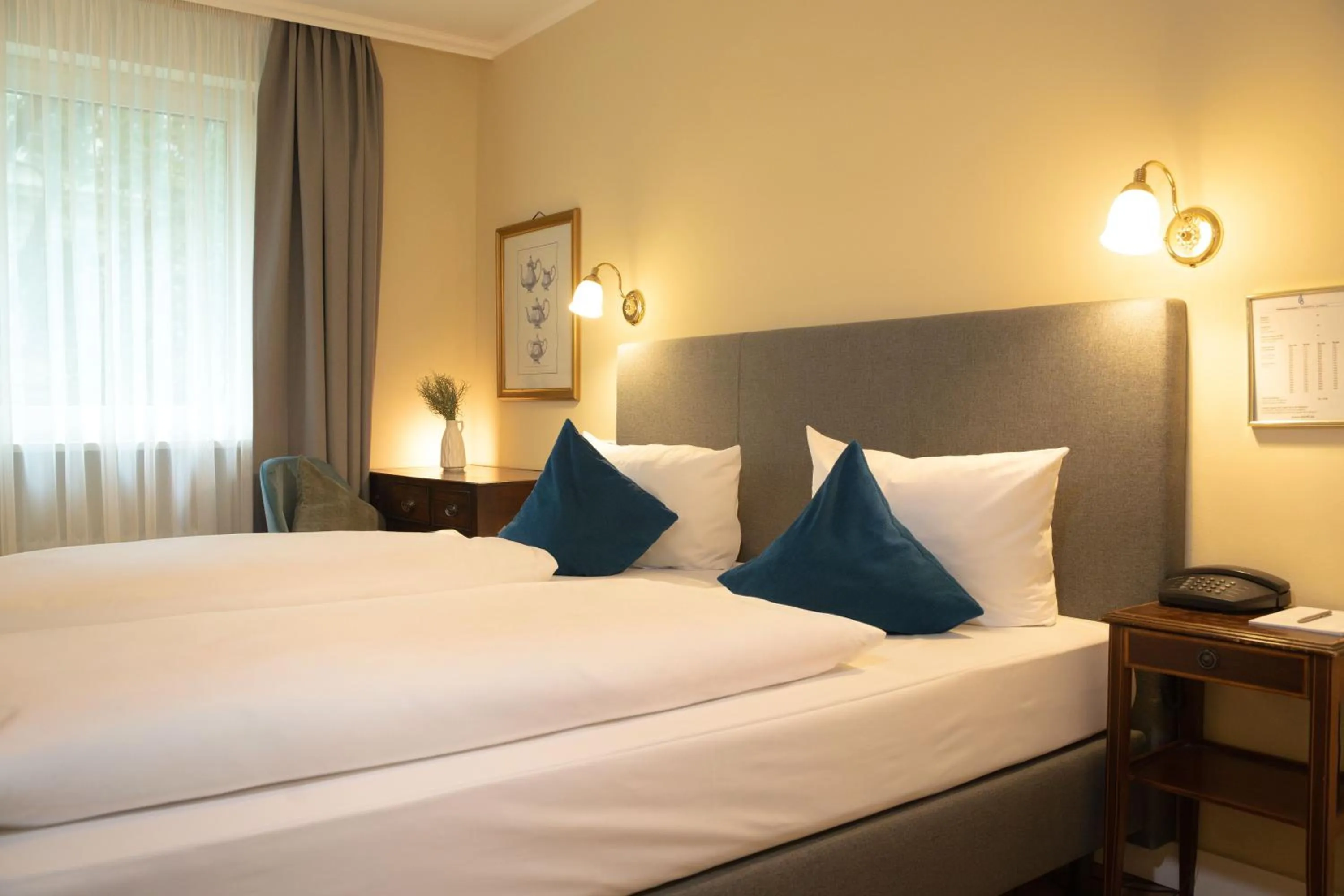 Bed in Hotel Altmünchen by Blattl