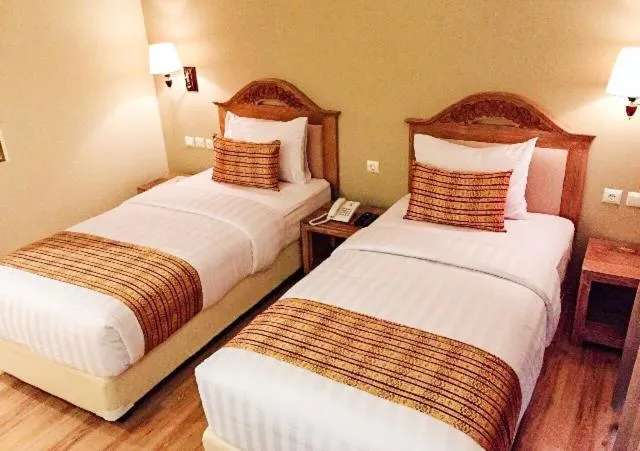 Bed in Ndalem Nuriyyat Villa, Spa & Skin Care