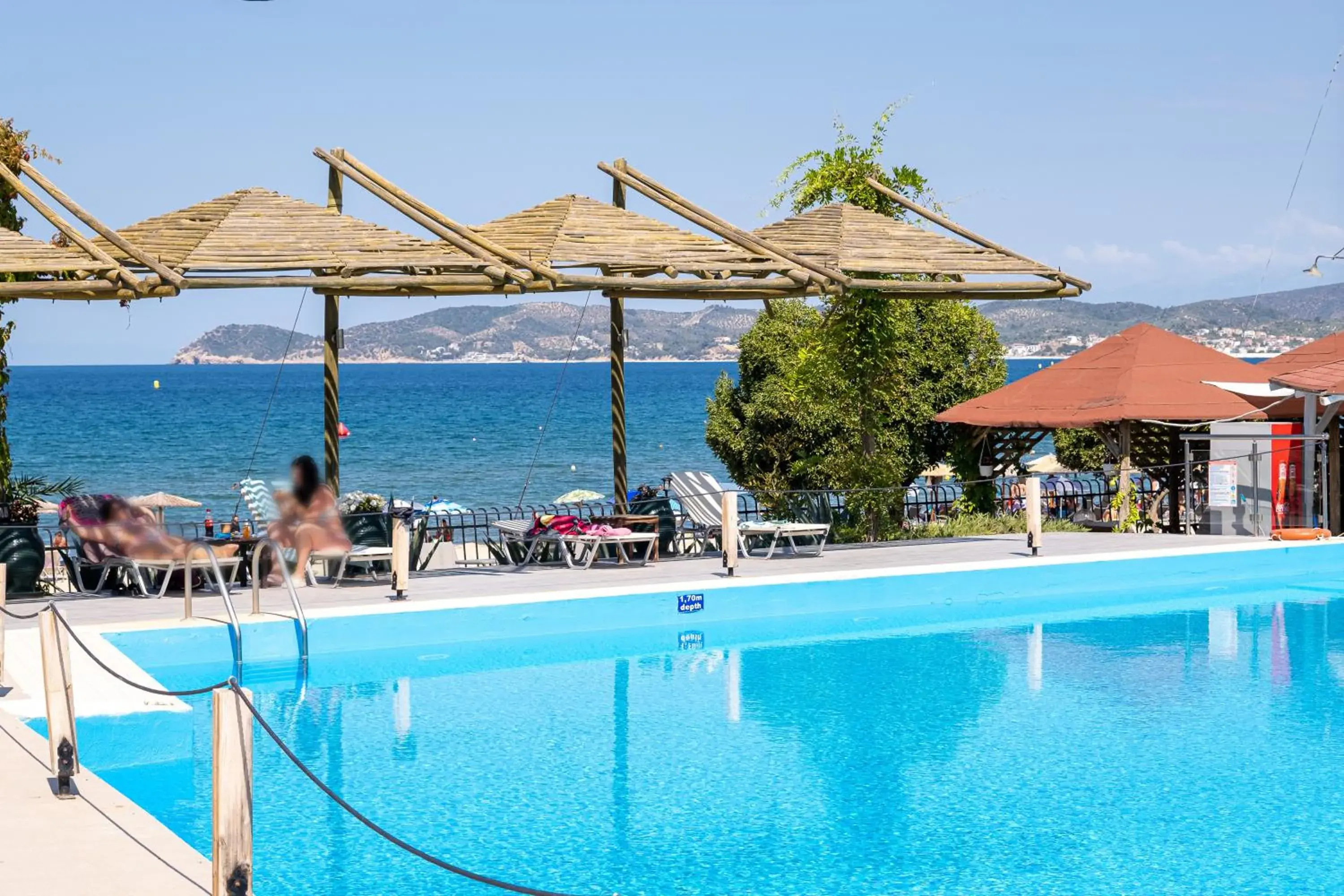 Pool view in Kamari Beach Hotel Pool view in Kamari Beach Hotel