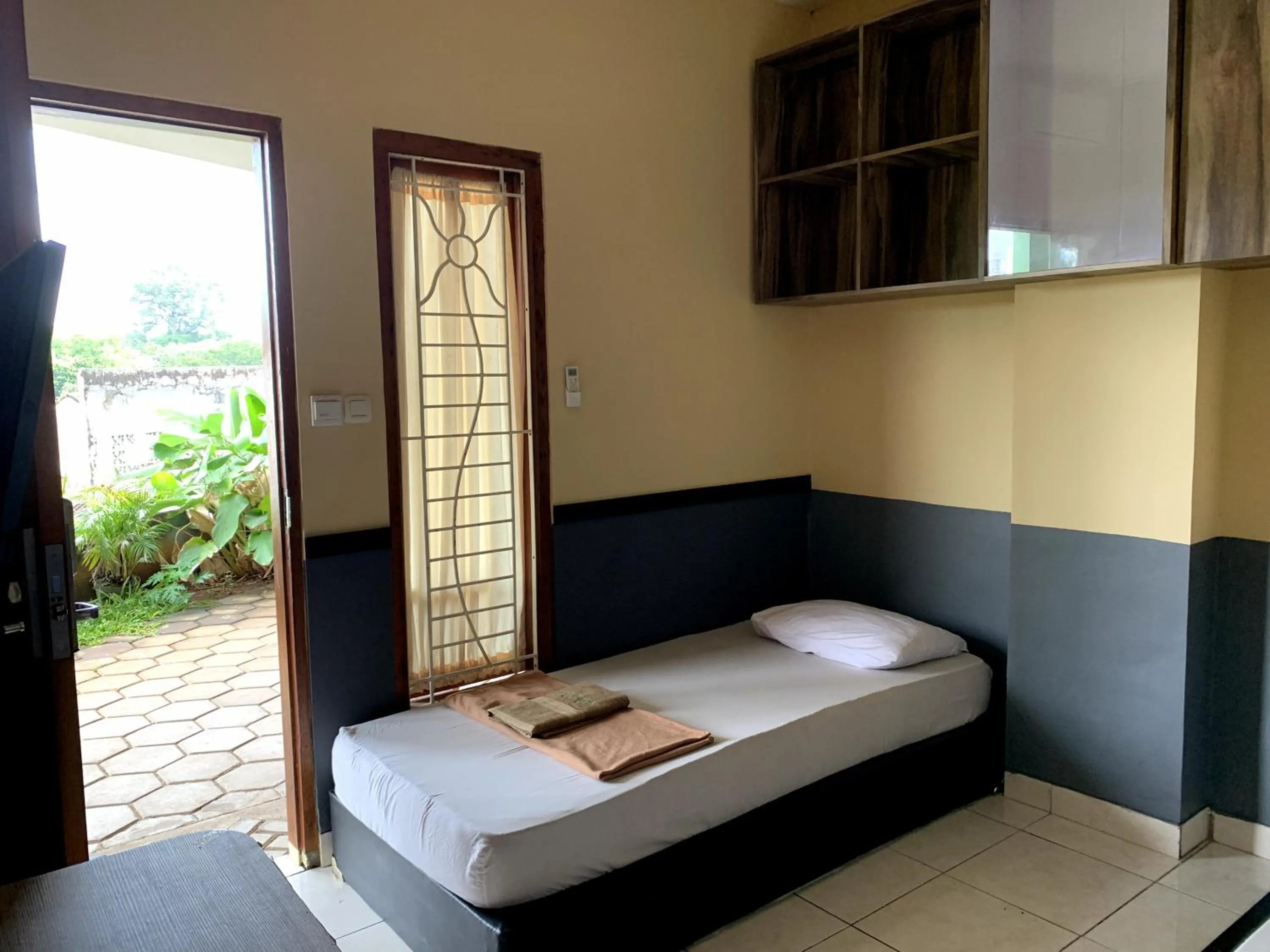 Bed in Omah Pelem Syariah