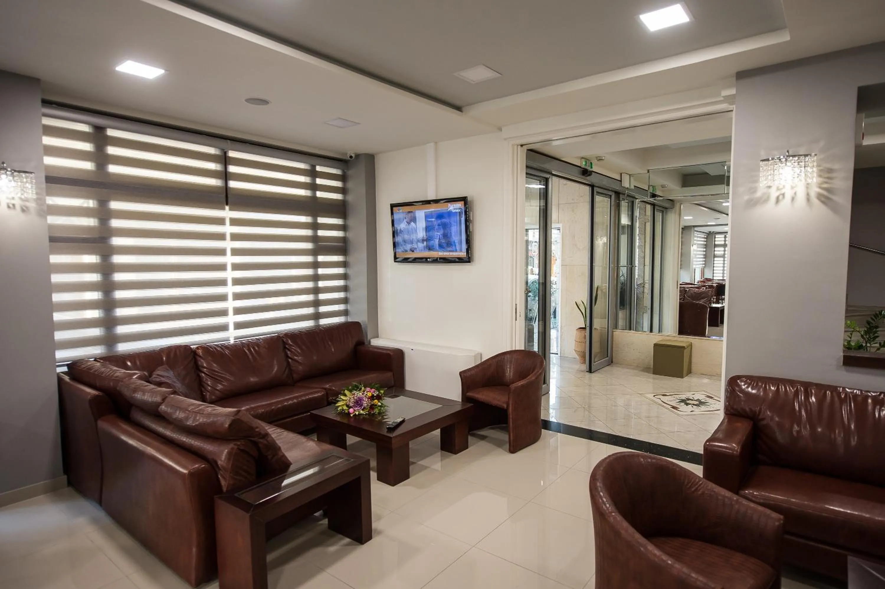 Communal lounge/ TV room in Hotel Olympos